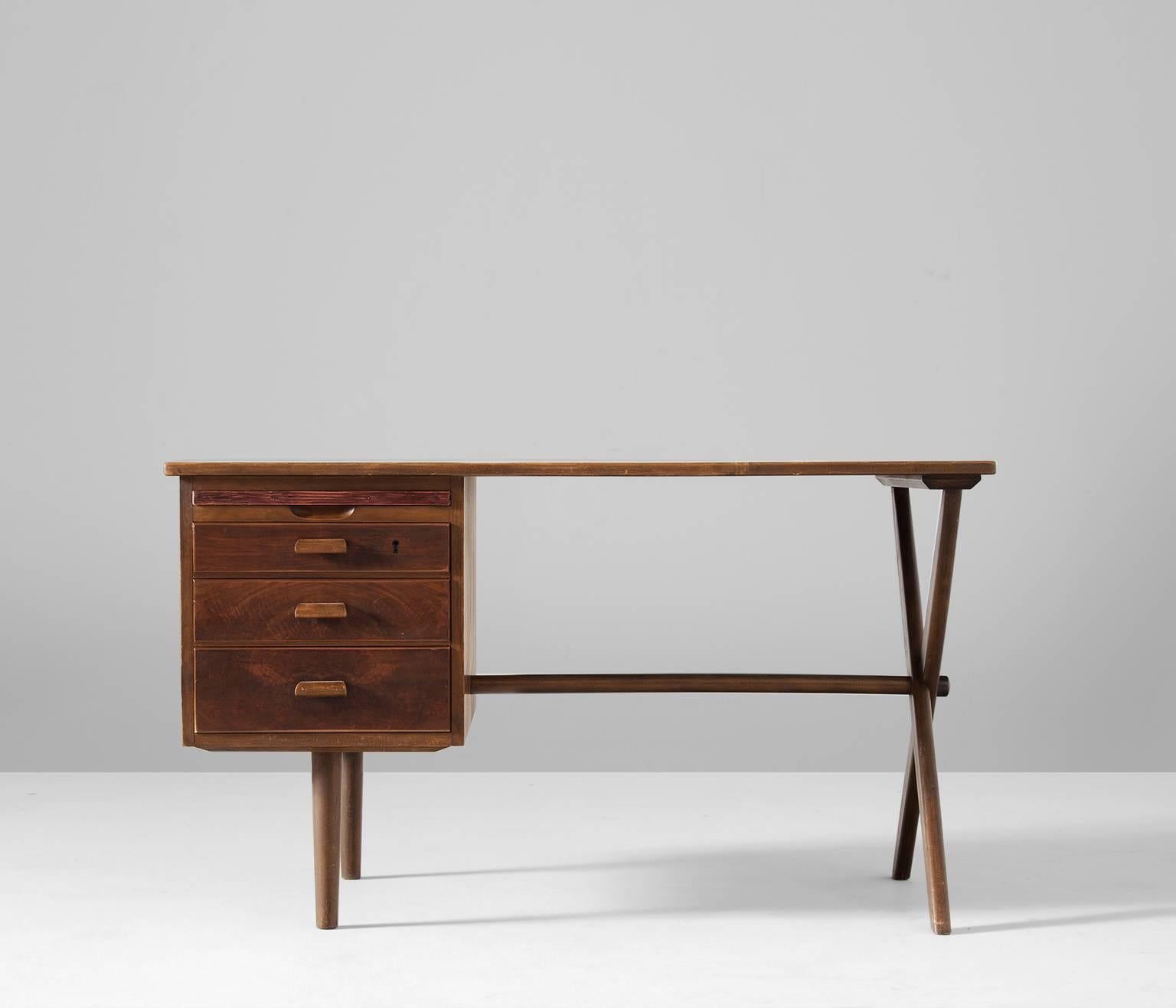 Desk, in walnut, European 1950s. 

Small wooden desk. This desk in walnut is equipped with three drawers. X-shaped frame with tapered cylindrical legs. Beautifully detailed with beech frame around the top.  

Free shipping for all European