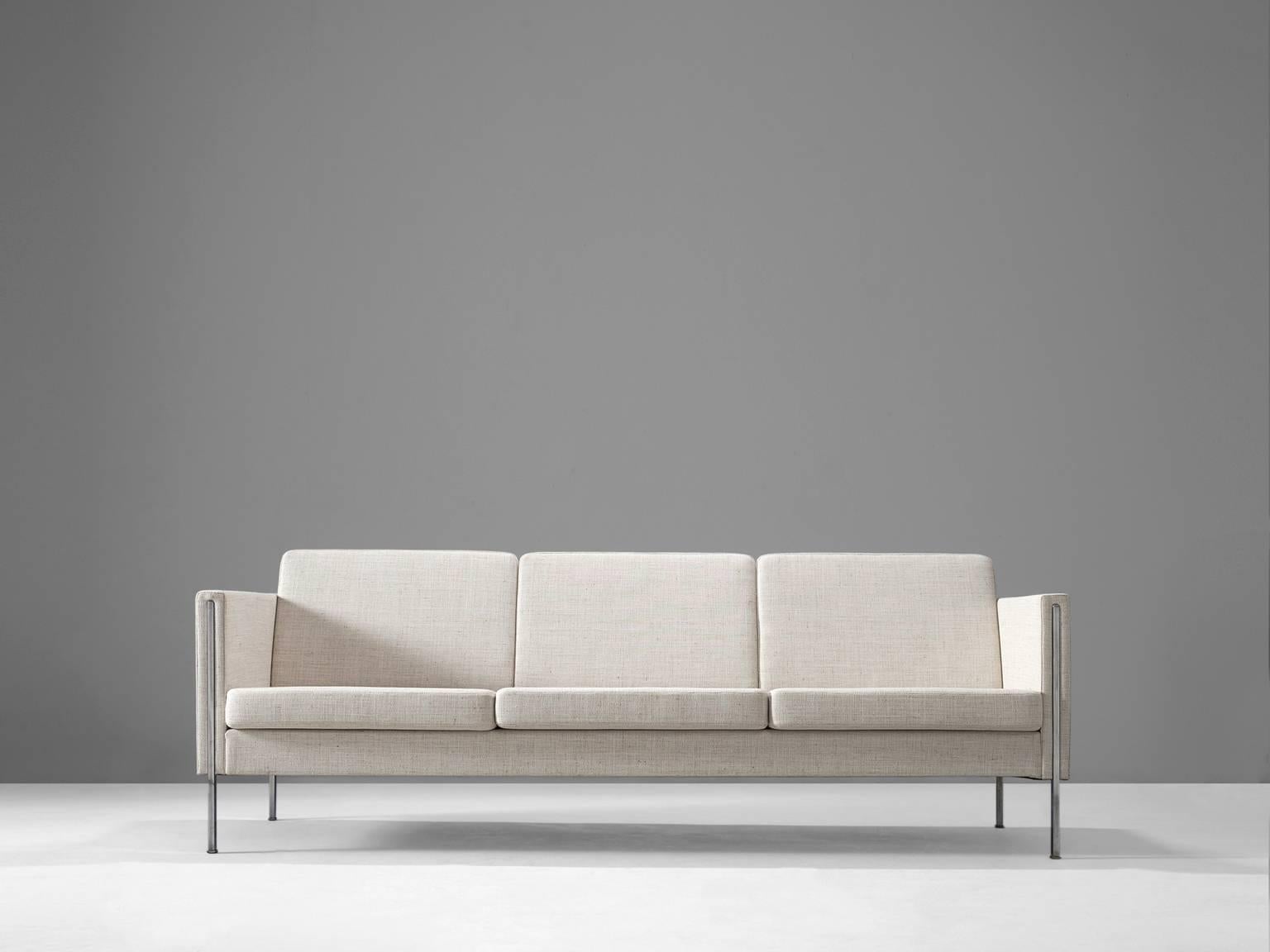 Sofa model '442,' in fabric and stainless steel, by Pierre Paulin for Artifort, France/Netherlands 1962. 

This comfortable three seater sofa show elegant stainless steel details. The combination of stainless steel and the light colored fabric