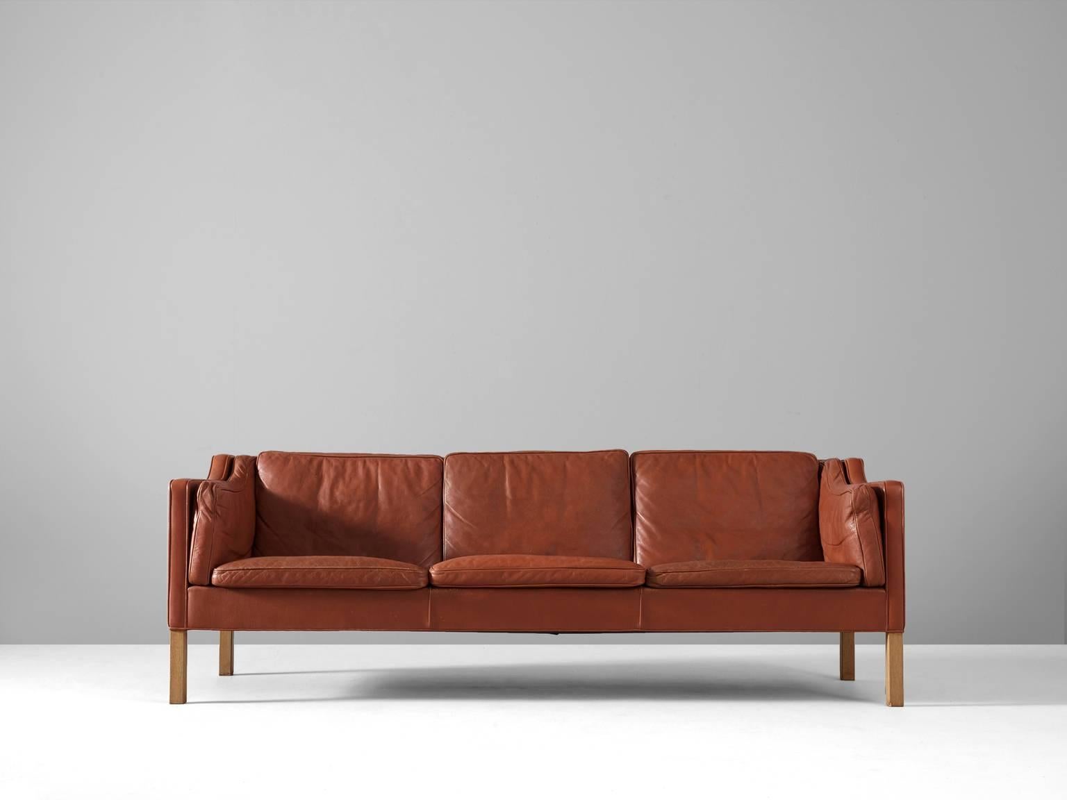 Three-seat sofa BM2213, leather and oak, by Børge Mogensen for Fredericia Stolefabrik, Denmark 1962. 

Very well conditioned three-seat sofa from Børge Mogensen. This model was designed by Mogensen for his own home, in his goal to create the