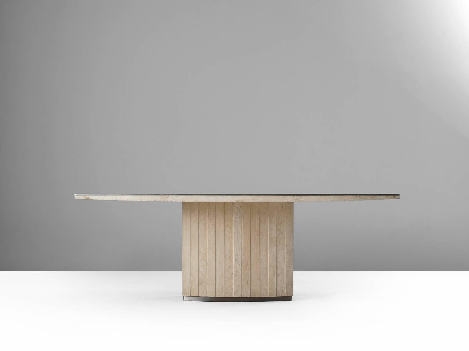 Dining table, in travertine and steel, by Willy Rizzo, Italiy 1970s. 

Dining table, solid travertine top with steel edges. Fluting pedestal base. 
Stately and modern design. Also seen in the combination of materials: luxurieus travertine and modern
