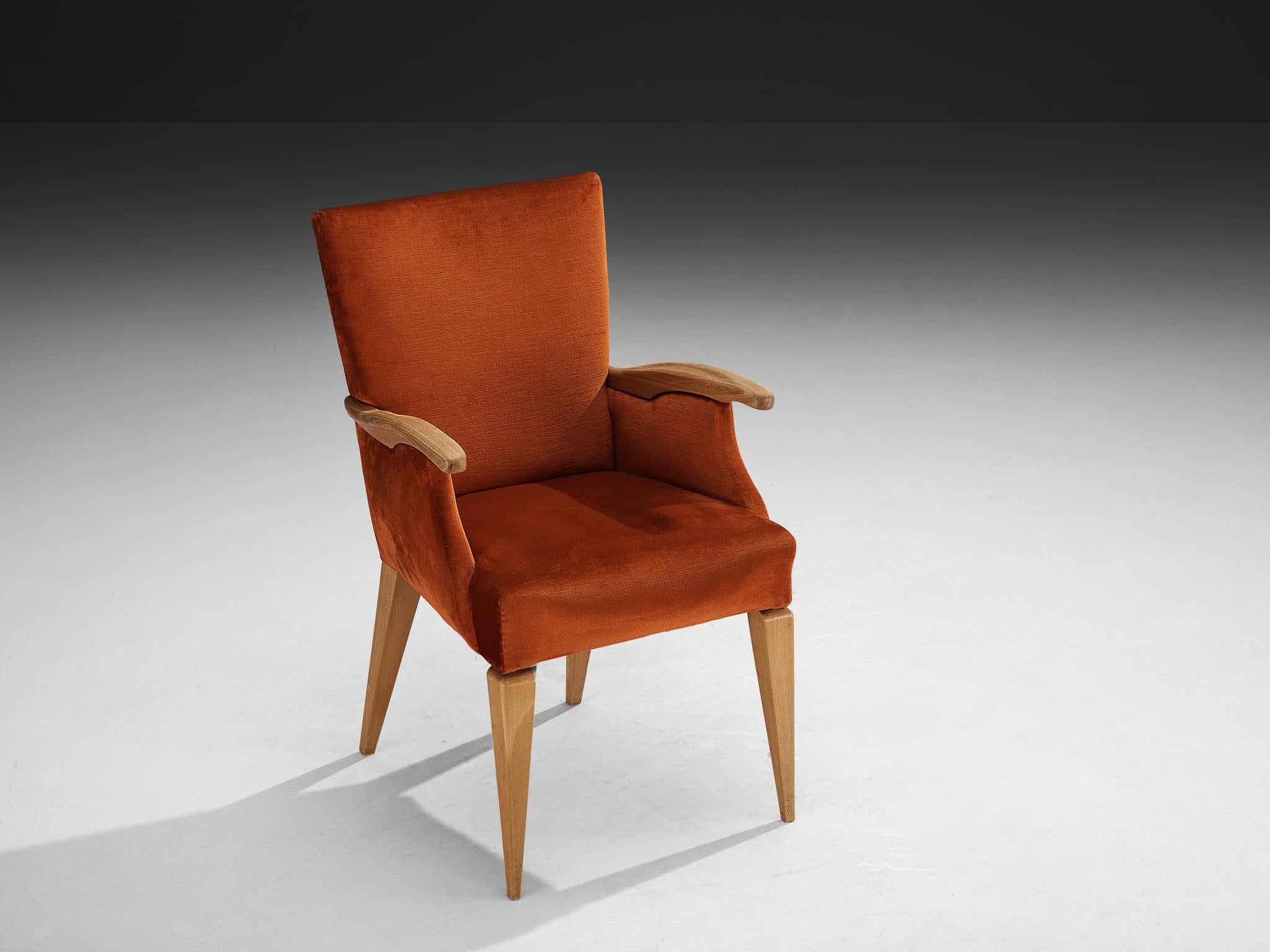 In the manner of Melchiorre Bega, armchair, cherry, velvet fabric, Italy, 1950s 

This elegant piece of furniture is made in Italy in the 1950s. The stylistic elements and overall design distinctly showcase the refined craftsmanship and aesthetic of