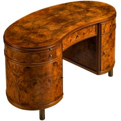Bureau autoportant Fontana Arte en loupe de noyer et laiton