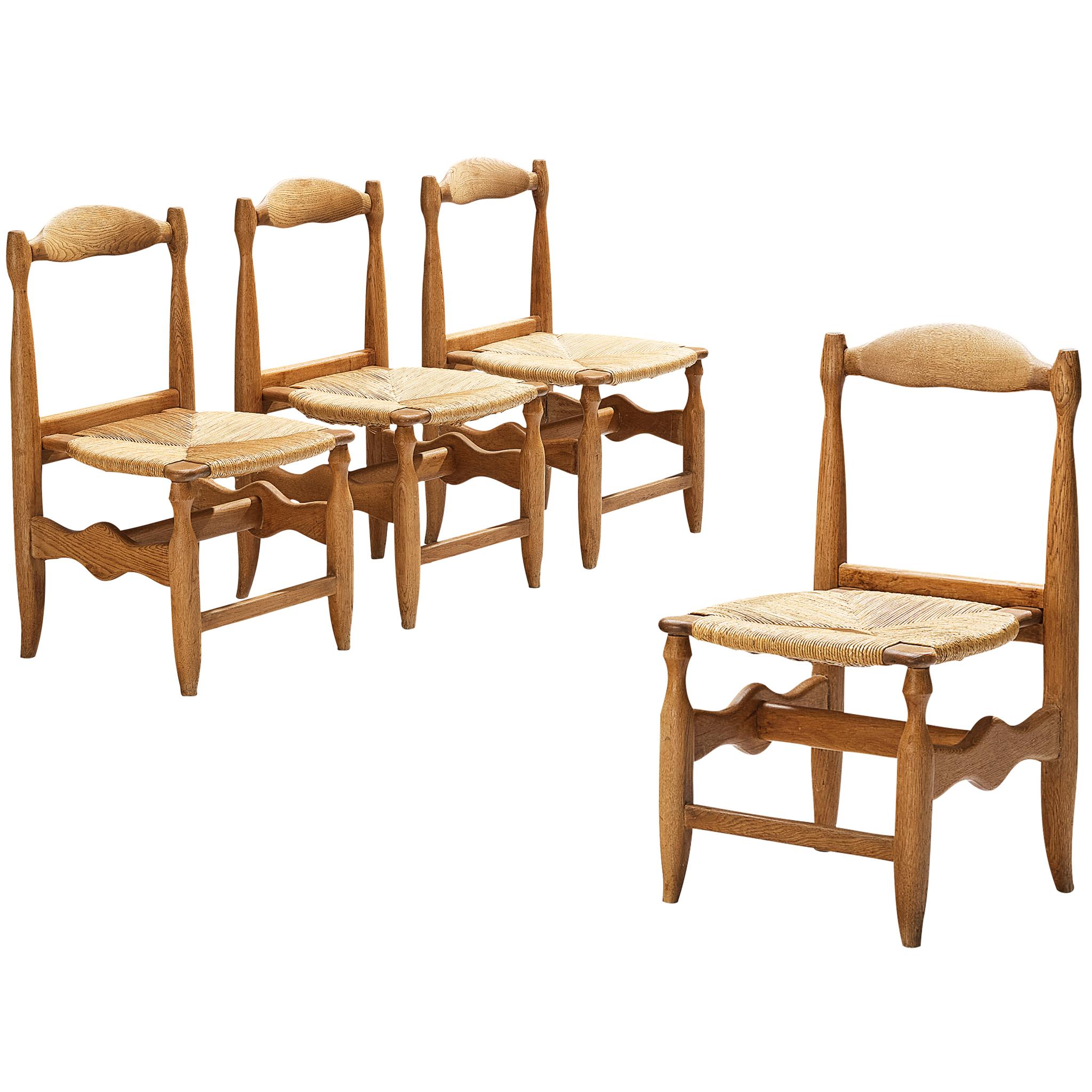 Guillerme & Chambron Set of Four 'Charlotte' Dining Chairs in Oak and Rush For Sale