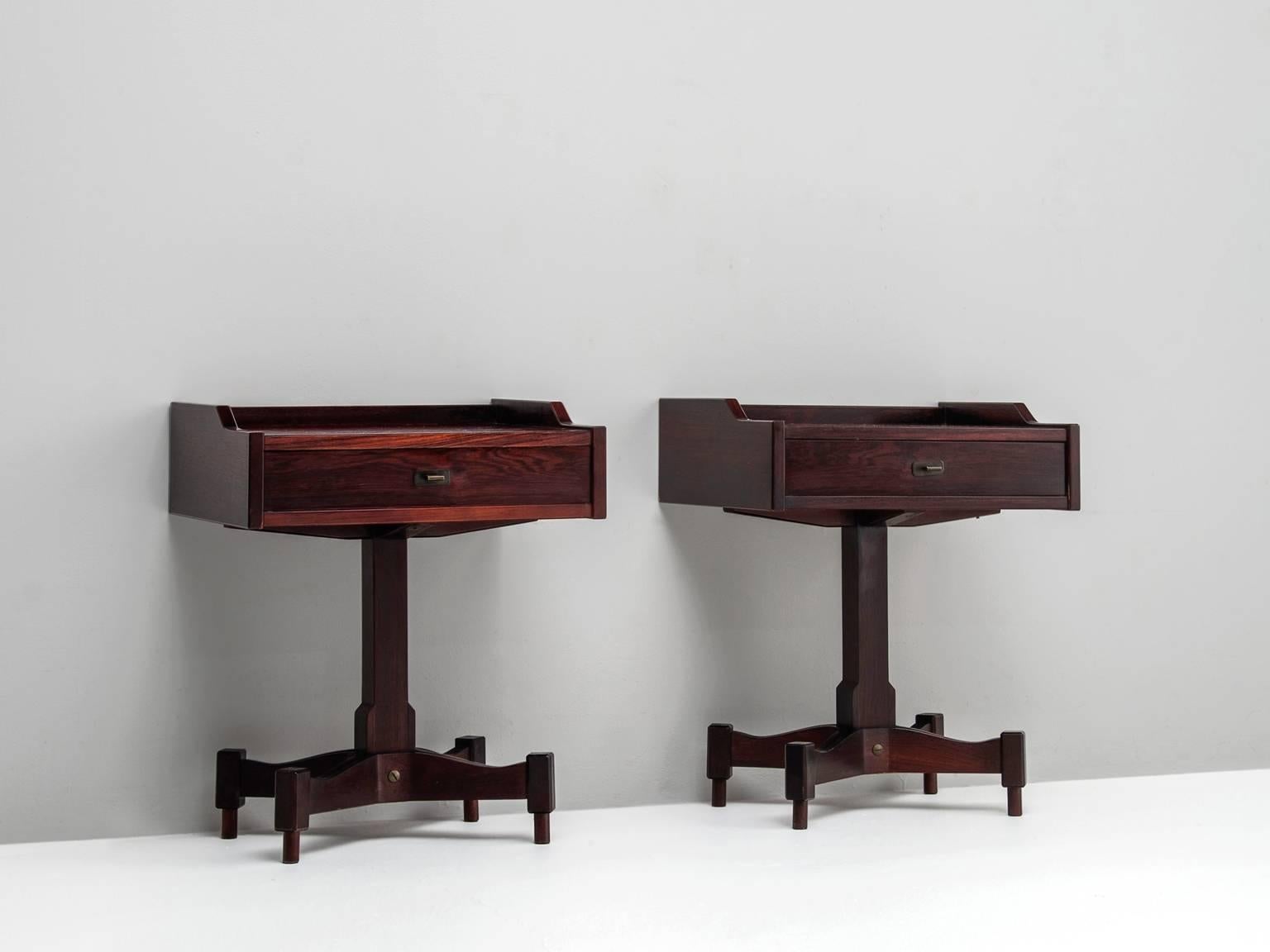 Pair of rosewood nightstands model SC 50, in rosewood and brass, by Claudio Salocchi for Sormani, Italy 1962.

Architectural pair of side tables. The typical expressive highly detailed base certainly provide an elegant touch. The table and drawer