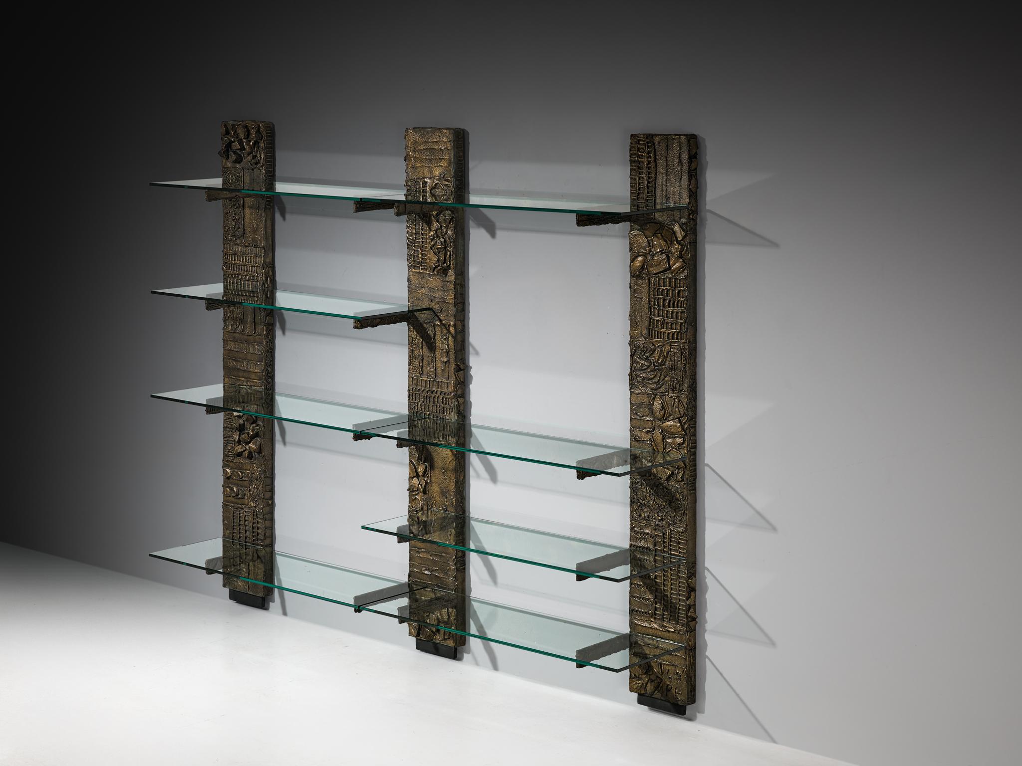 Paul Evans for Directional, wall shelves, model 'PE 68', epoxy bronzed resin over wood, glass, United States, 1970s

Grand wall unit by Paul Evans, designed for Directional in the 1970s. This striking piece of 20th-century design history commands