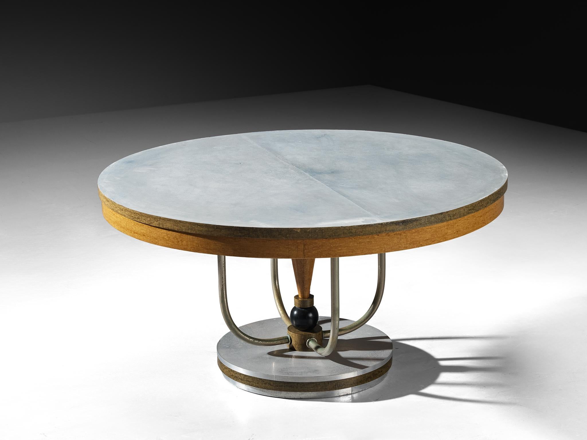 Francesco Rapisardi, dining or center table, aluminum, buxus veneer, nickel-plated brass, wood, Italy, late 1920s/ 1930s

An exceptional design piece by Francesco Rapisardi, the brother and collaborator of Italian architect Gaetano Rapisardi