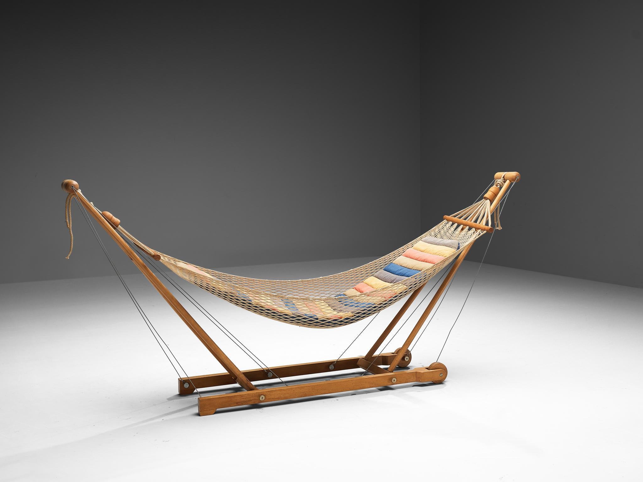 Waldemar Rothe for Rosenthal, 'Relaxer I' hammock, beech, fabric, rope, iron, Germany, 1974

For a calm day off or a break in-between, this wonderful hammock by Waldemar Rothe will ensure a comfortable and satisfying body relaxation. The design is
