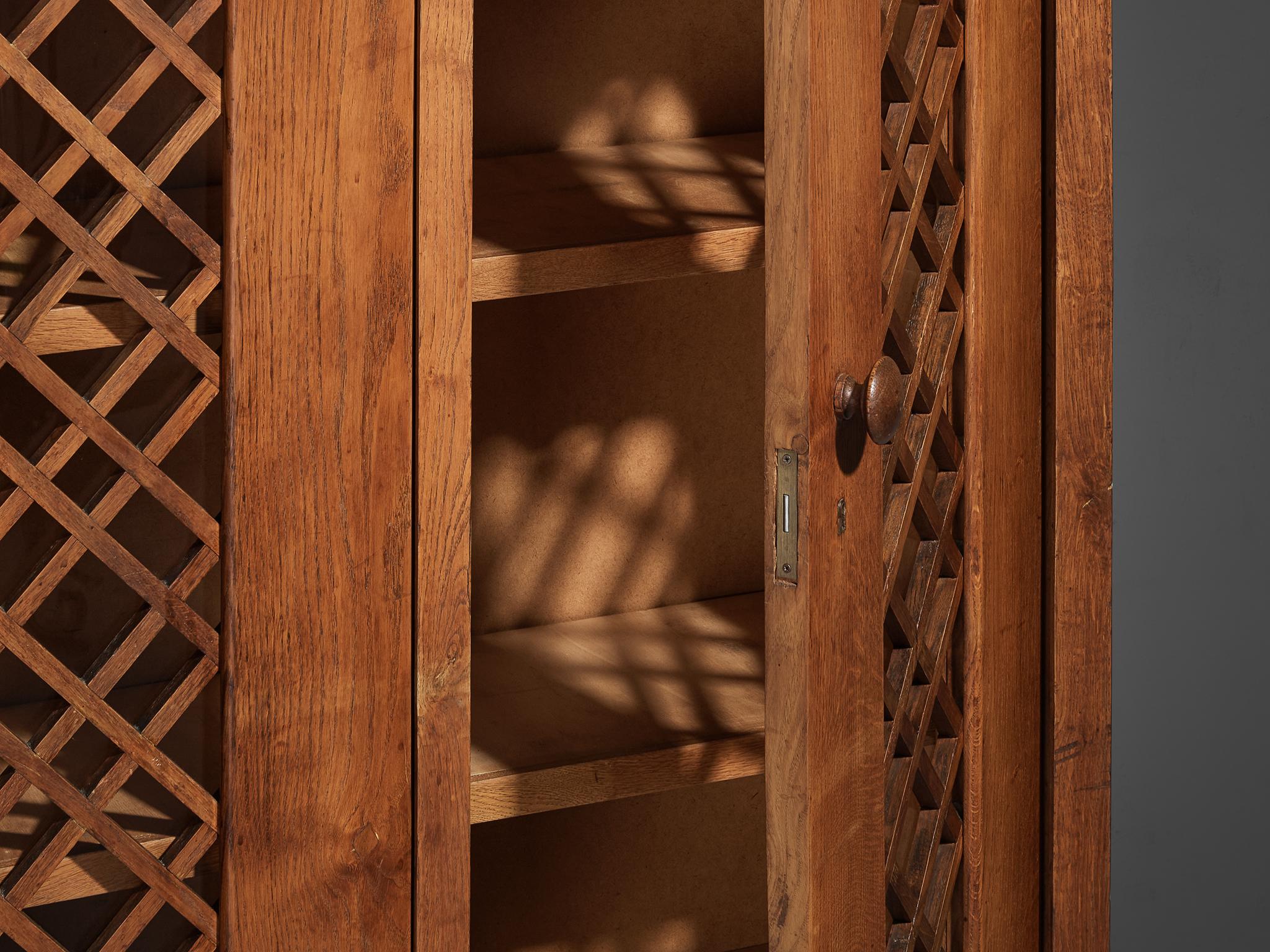 Mid-Century Modern 1940s Cabinet in Solid Oak with Latticework For Sale