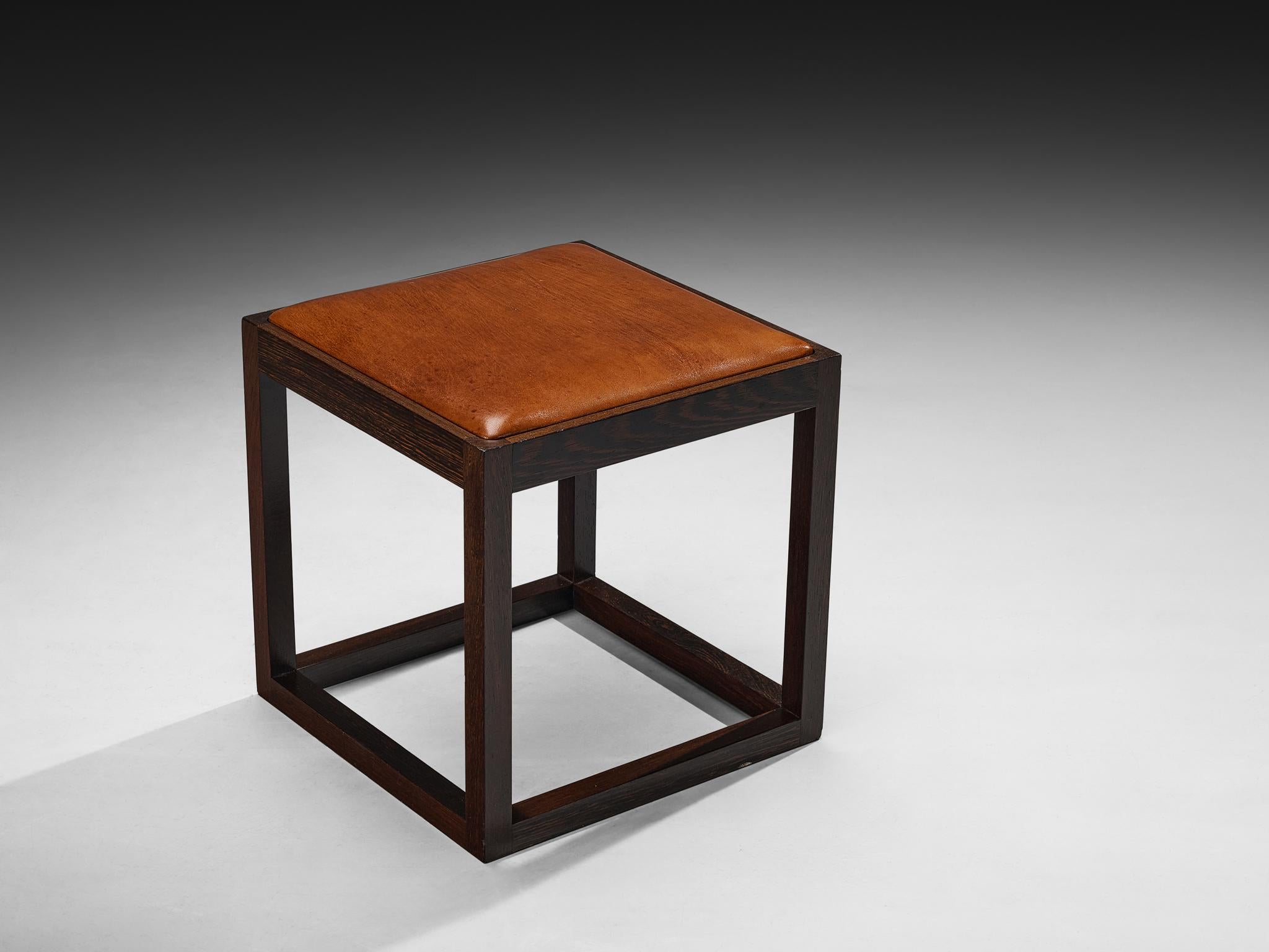 Claus Bonderup & Torsten Thorup, stool, wengé, leather, Denmark, 1960s/1970s

Presenting an exquisite wengé stool, designed by design duo Claus Bonderup and Torsten Thorup. This stool was meticulously crafted in the late 1960s to 1970s, specifically