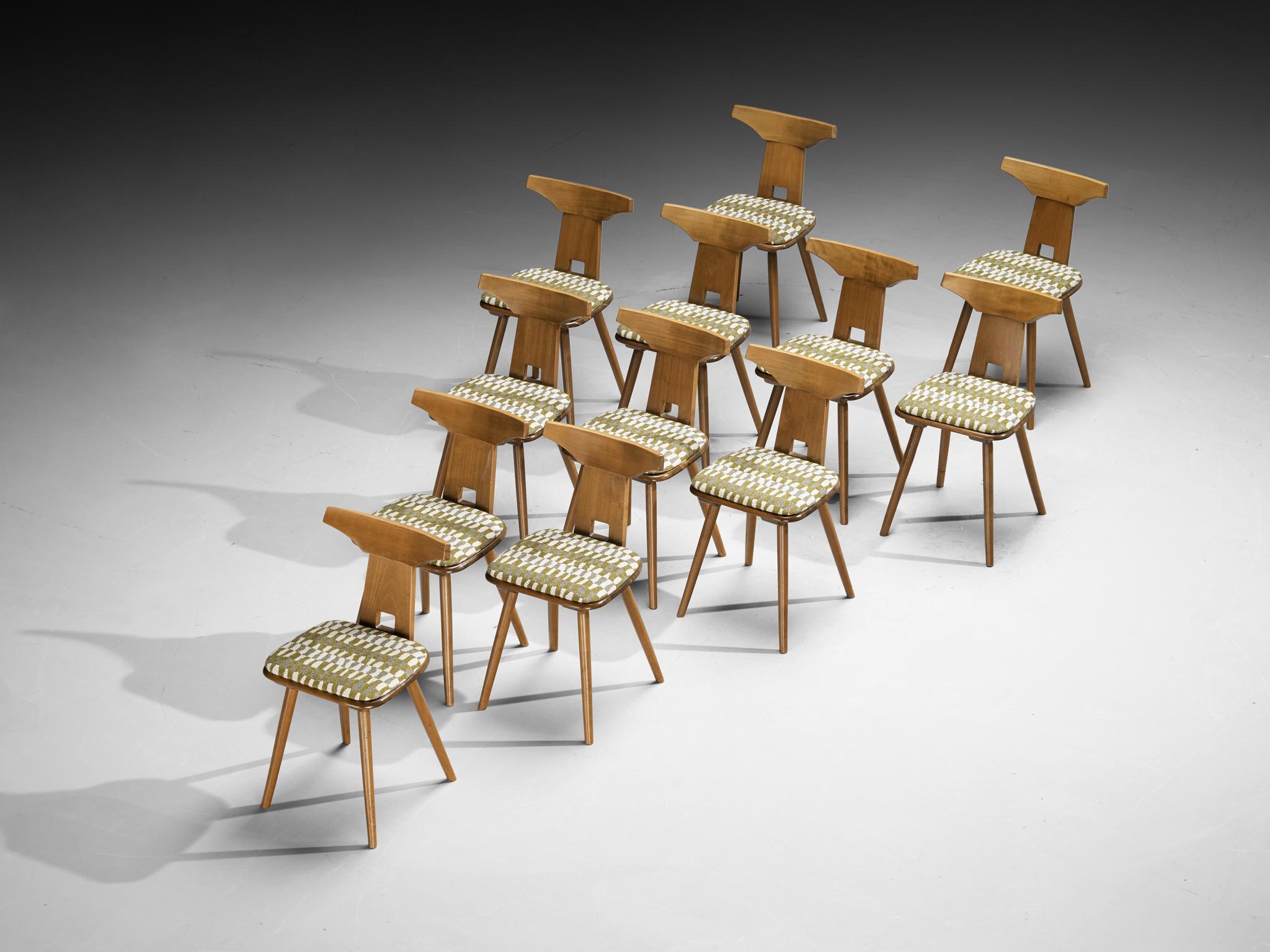 Dining chairs, beech, fabric, Europe, 1960s

Crafted in Europe in the 1960s, this lovely and cheerful set of chairs is a fresh add to an interior. The frame is made from solid beech wood, showcasing warm tones and a beautifully tapered leg structure