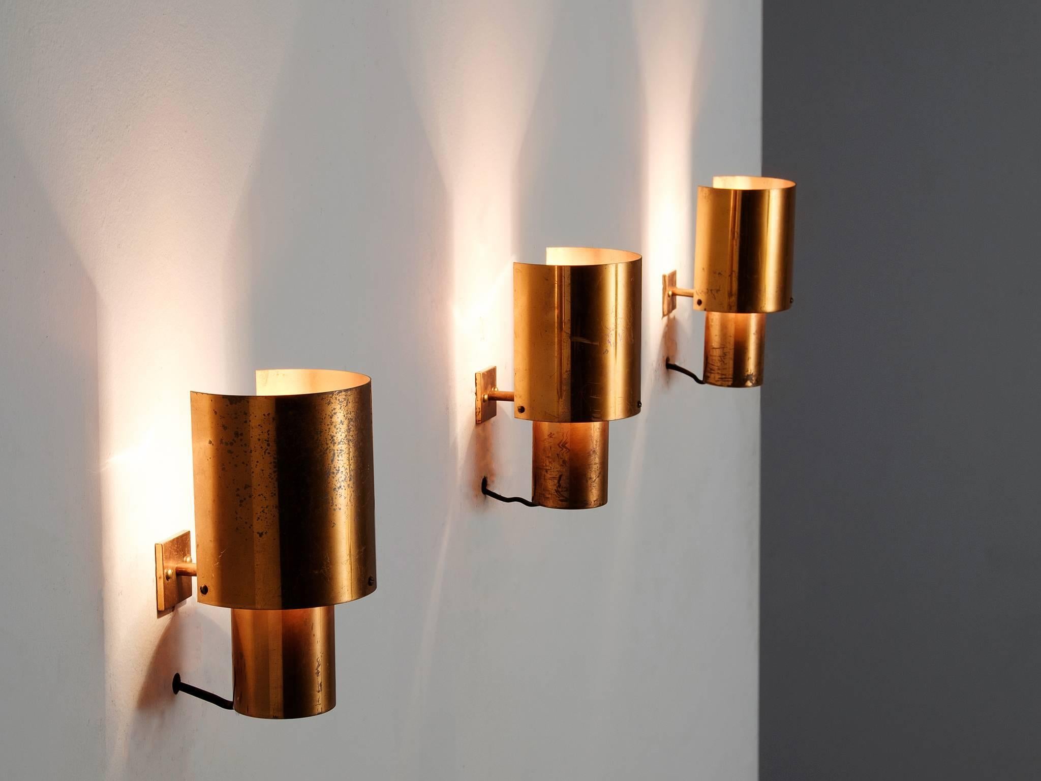 Set of six sconces, in copper, Europe, 1970s. 

Set of six copper wall lights. These lights have a quite simplistic design. The focus is on the material. The copper shows and interesting patina. Due material, these lights create a warm and diffuse