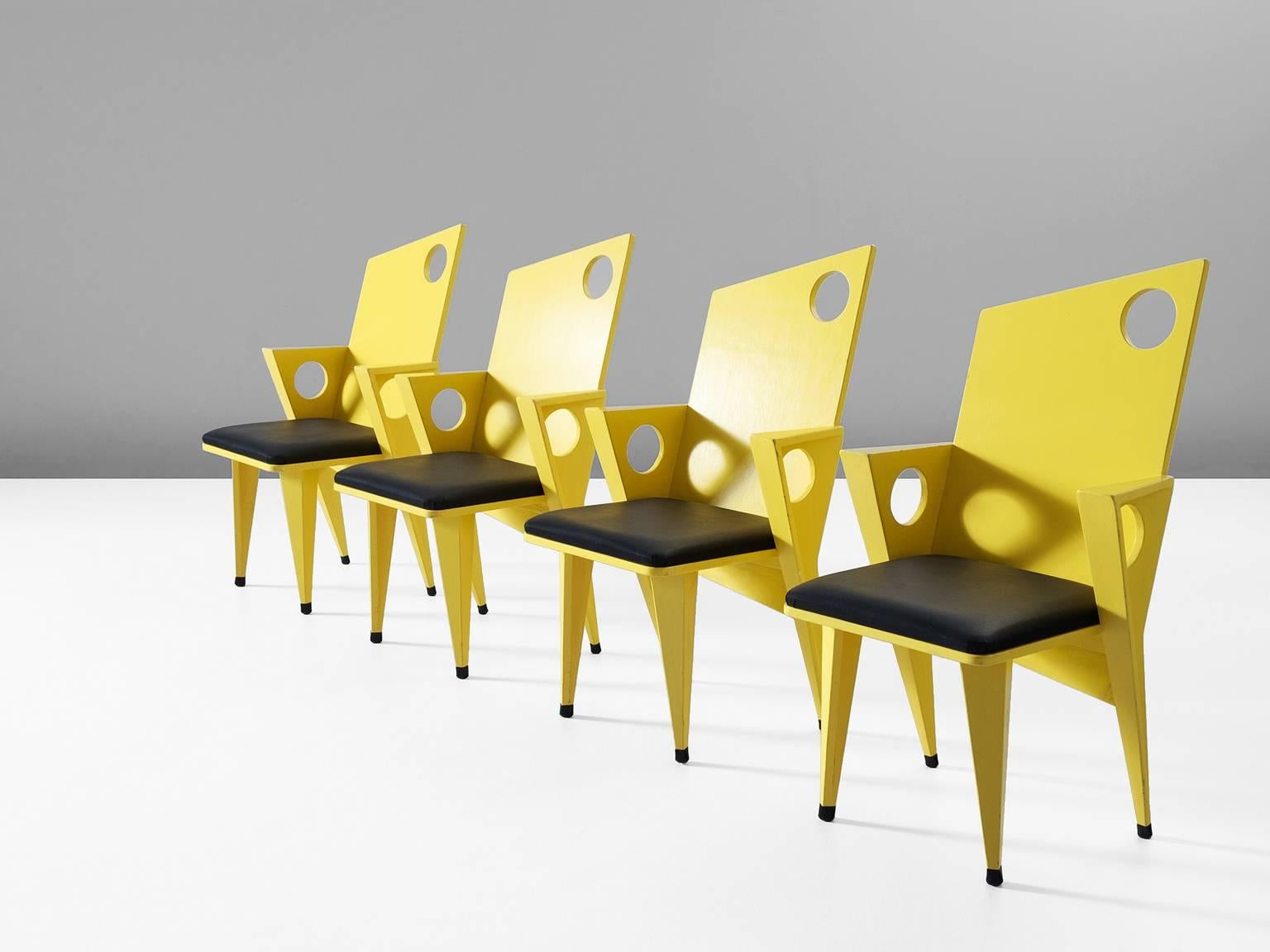 Set of four armchairs, in wood and faux-leather, Europe, 1980s.

Set of four frivolous armchairs in bright yellow. These Memphis style chairs are designed with angles and diagonal lines. Except from the seating all parts are basically designed