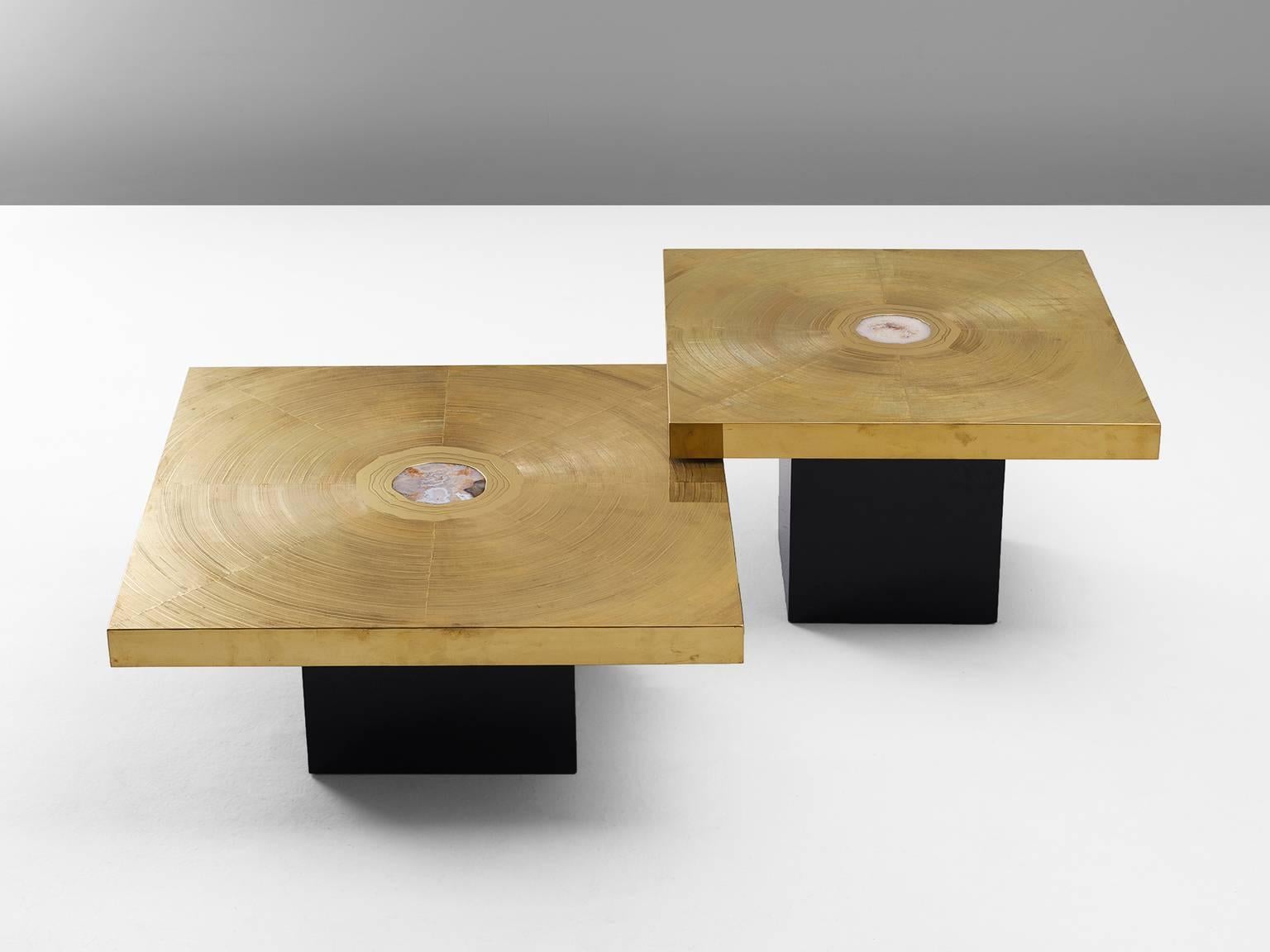 Set of two coffee tables, in brass, gemstone and wood, Belgium 1970s

Set of two signed sculptural coffee tables with beautiful etched brass top. These tables are a piece of art on their own. The square top shows a graphical spiral of lines in
