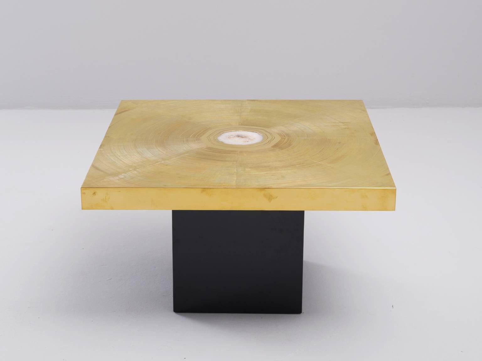 Coffee tables, in brass, gemstone and wood, Belgium 1970s

Signed Sculptural coffee table with beautiful etched brass top. This table is a piece of art on it's own. The square top shows a graphical spiral of lines in brass. In the middle is a