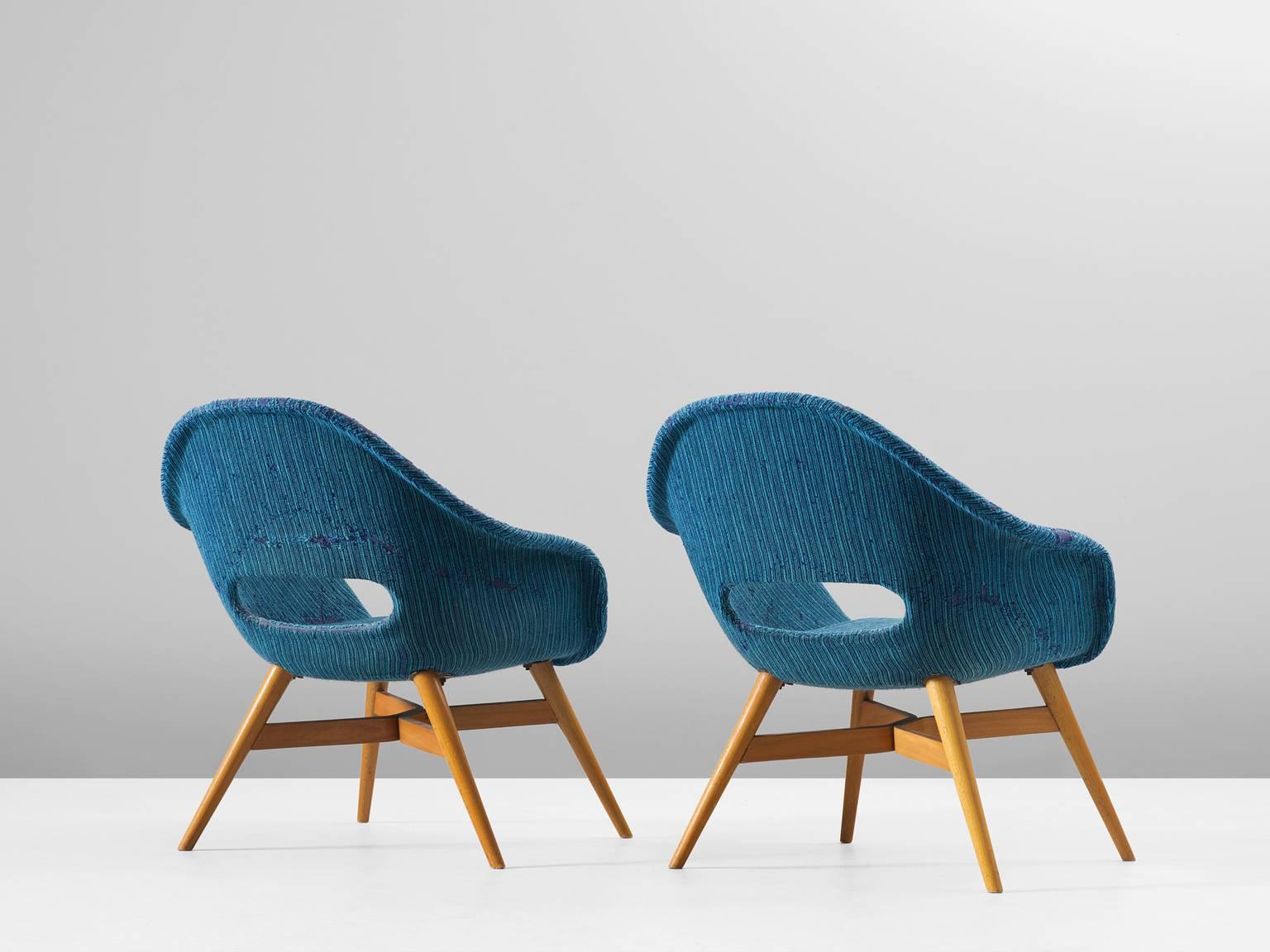 Set of two lounge chairs, in fabric and beech, by Miroslav Navatril, Czech Republic 1960s. 

Pair of two modern armchairs in blue upholstery. The blue fabric nicely combines with the blond beech frame. Four cylindrical tapered legs with bended and