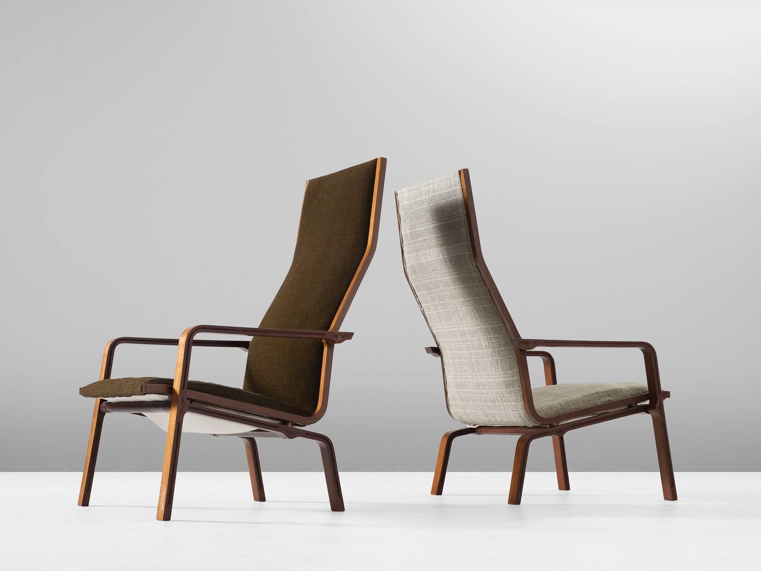 Set of two St. Catherine chairs model 4335, in rosewood and fabric by Arne Jacobsen for Fritz Hansen, Denmark, 1962.

Pair of high back chairs by Danish designer Arne Jacobsen. Were Jacobsen is known for his organic designs, these easy chairs show a