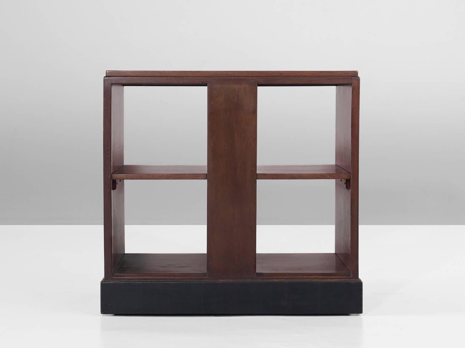 Cabinet, in wood, for H.P. Mutters, the Netherlands, 1930s. 

Small Art Deco cabinet with beautiful inlayed wood. The cubic cabinet is divided into two levels by a shelve, a cross connection creates four storage parts. By the absence of doors or