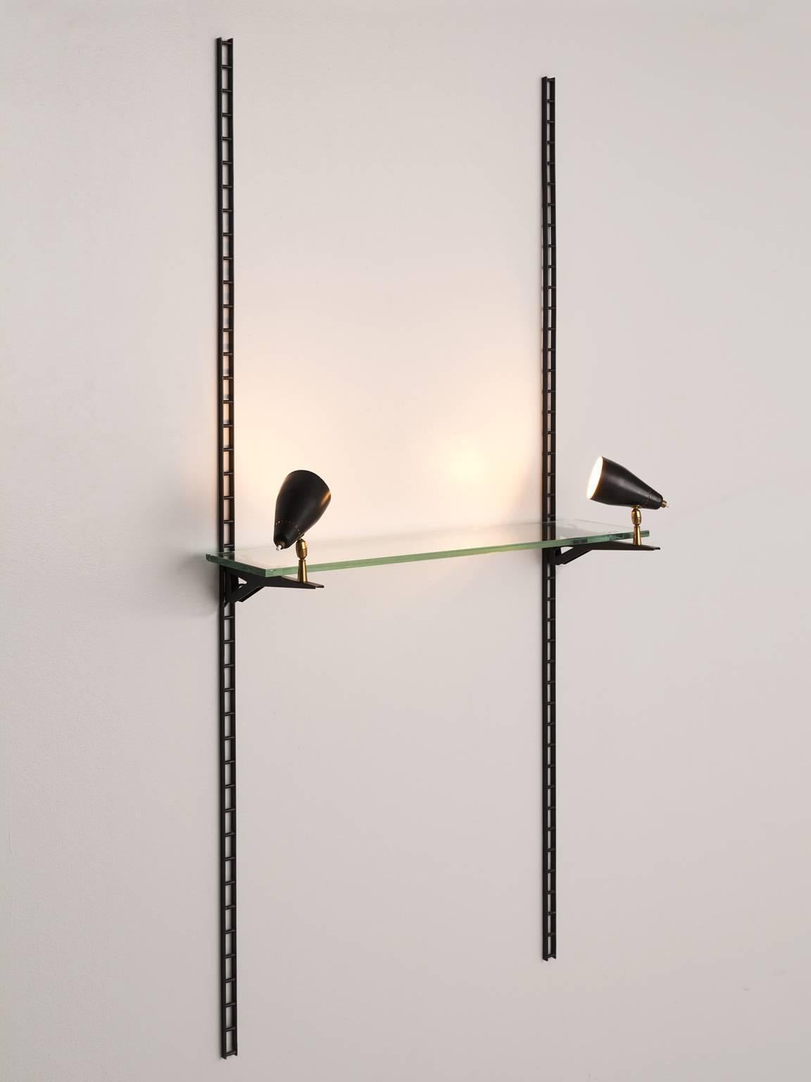 Illuminated display console, in metal, glass and brass, by Gino Sarfatti for Arteluce, Italy, 1970s. 

This very rare Arteluce wall lamps works as a display, due to the adjustable glass shelve that is placed on top of the lighting system. The lights