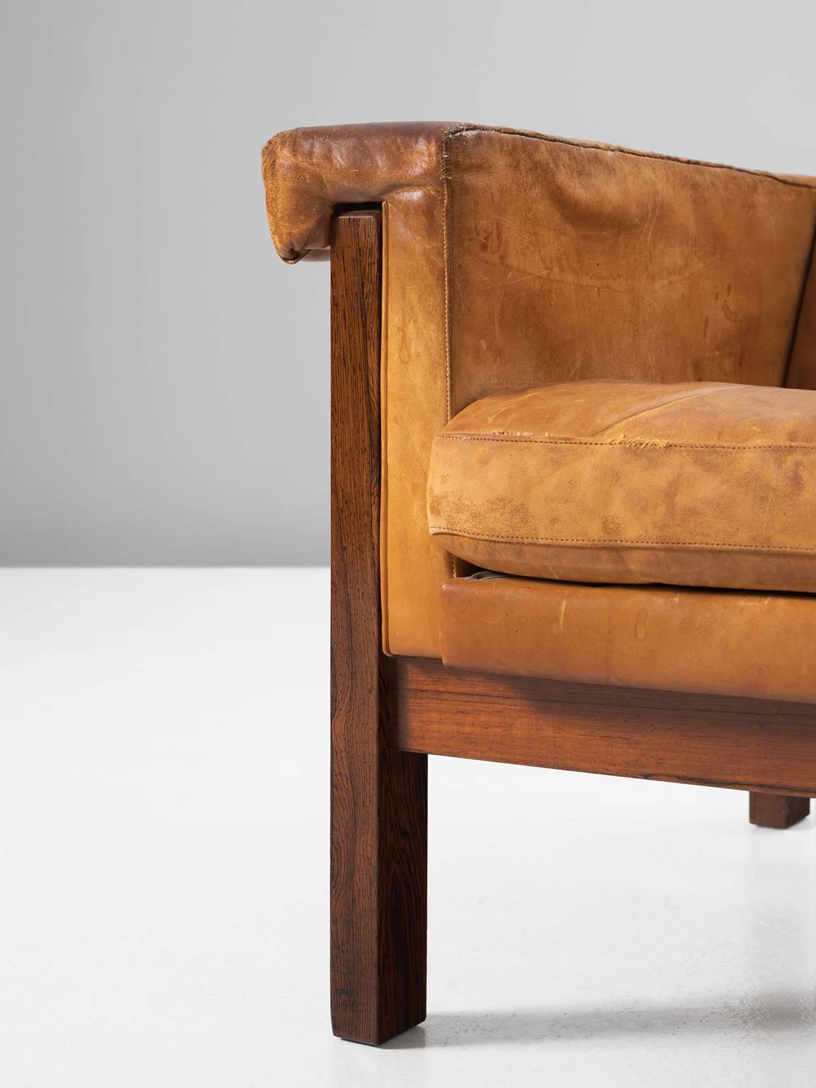 Mid-20th Century Danish Wingback Chair in Solid Rosewood and Patinated Cognac Leather