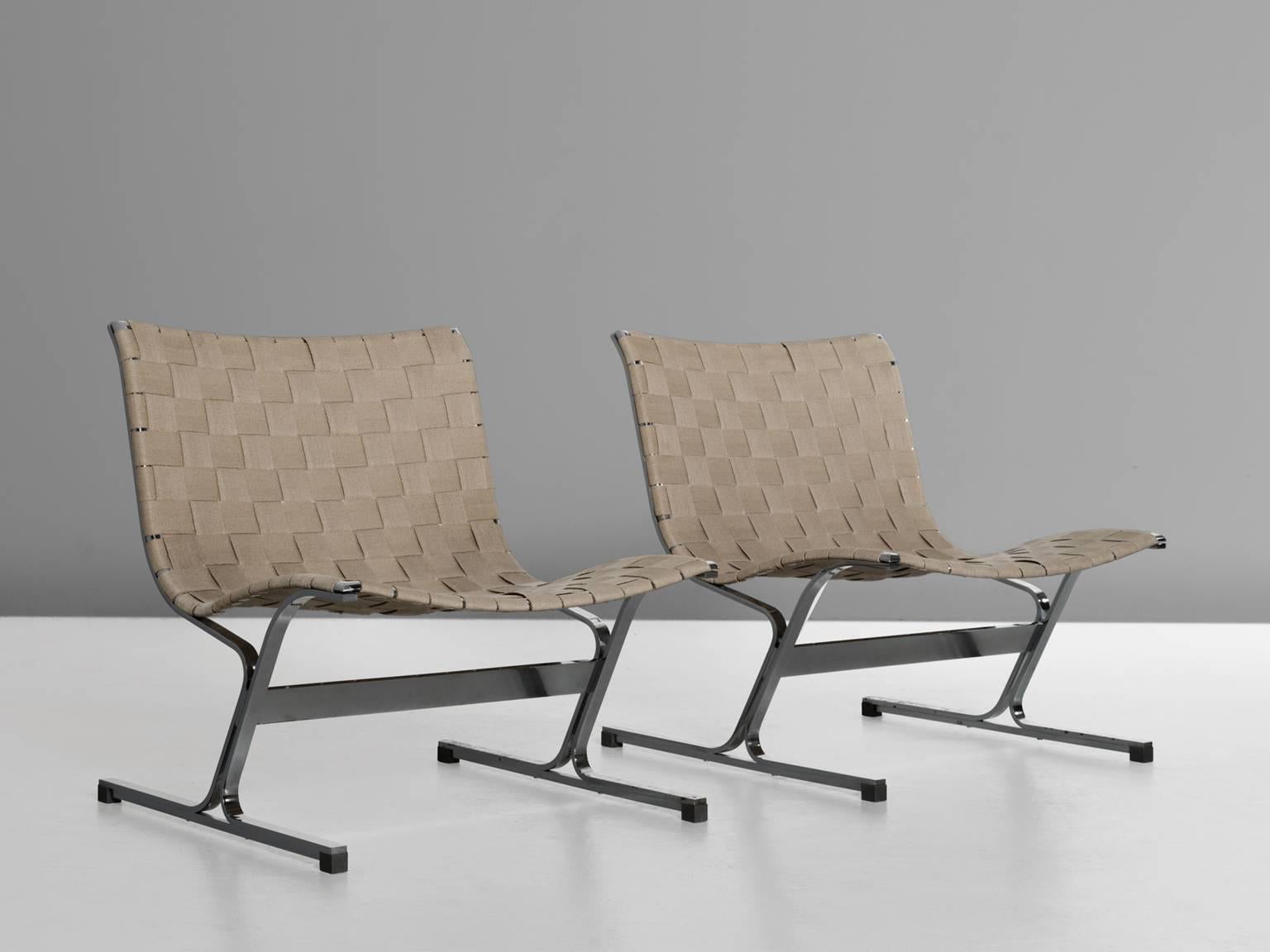 Set of two 'Luar' slipper chairs, in metal and canvas, by Ross Litell for ICF, Italy, 1965. 

Set of two modern easy chairs in chromed metal and woven canvas upholstery. These chairs show beautiful curves. The seating and back form an organic