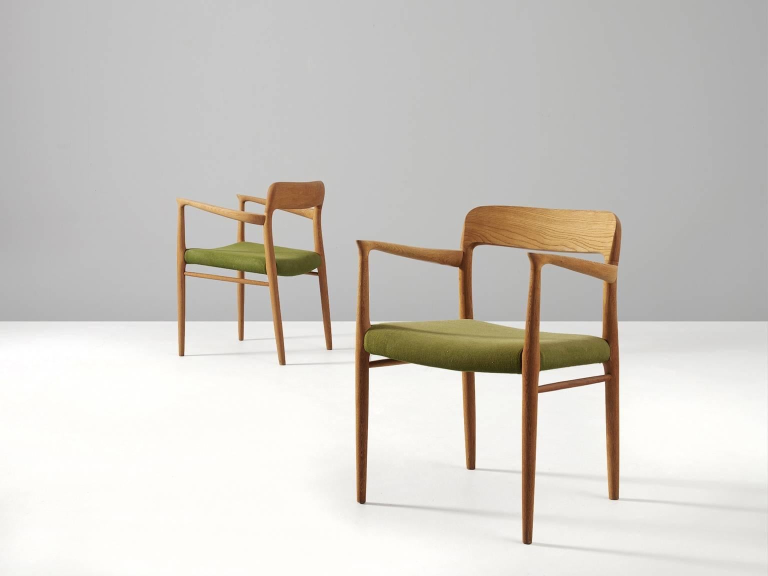 green fabric dining chairs