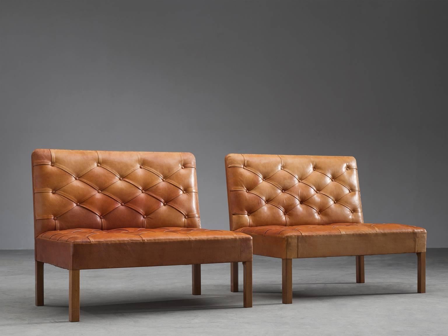 Set of two settee's model 4698, in leather and oak, by Kaare Klint for Rud Rasmussen, Denmark, 1933. 

This set of free-standing sofa's is one of the most iconic designs by Kaare Klint. They show a mix of functional, Minimalist and at the same