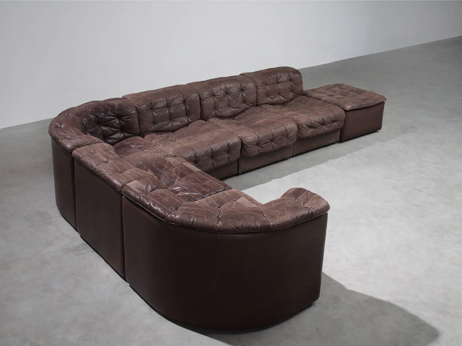 Sofa, DS11 sofa, dark brown patinated leather, 1970s. 

This comfortable leather sofa is manufactured by De Sede in Switzerland. Sectional sofa by the Swiss quality manufacturer De Sede. This sofa consists of seven elements of which one is without