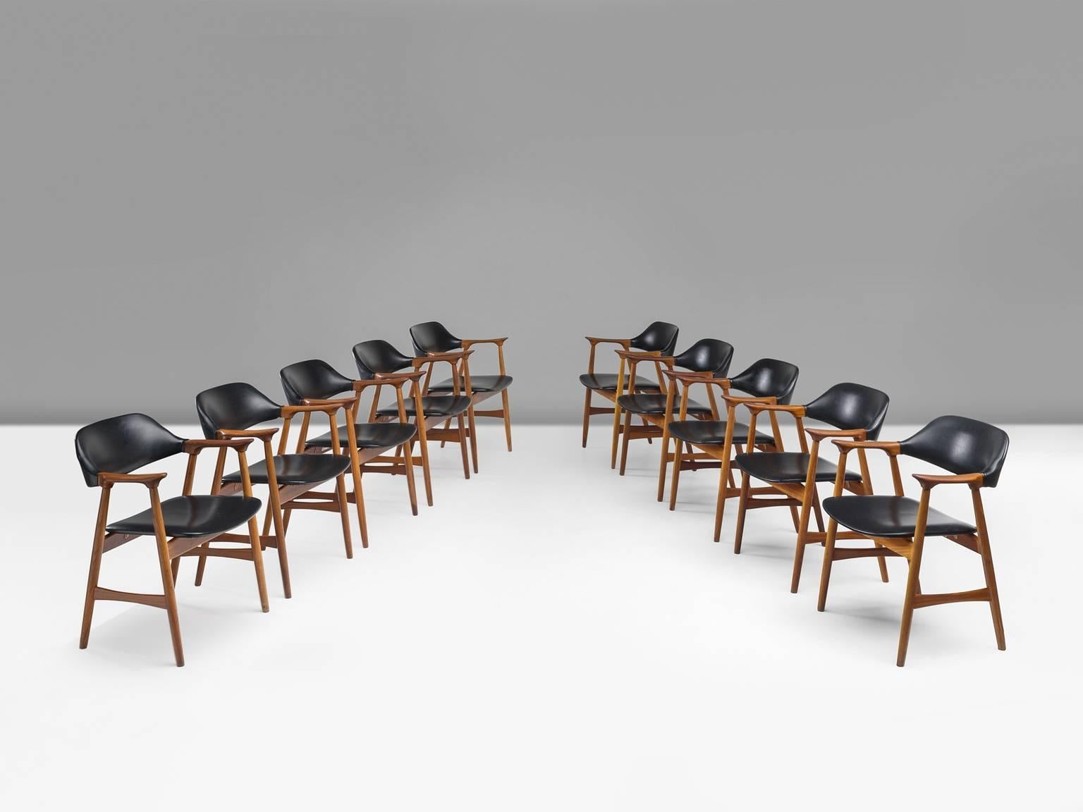 Set of ten armchairs, in teak and leatherette, Denmark, early 1950s. 

Very comfortable dining chairs, due to well-shaped armrests and ergonomic proportions of the back and seat. The sculptural back is very attractive, as the beautifully curved