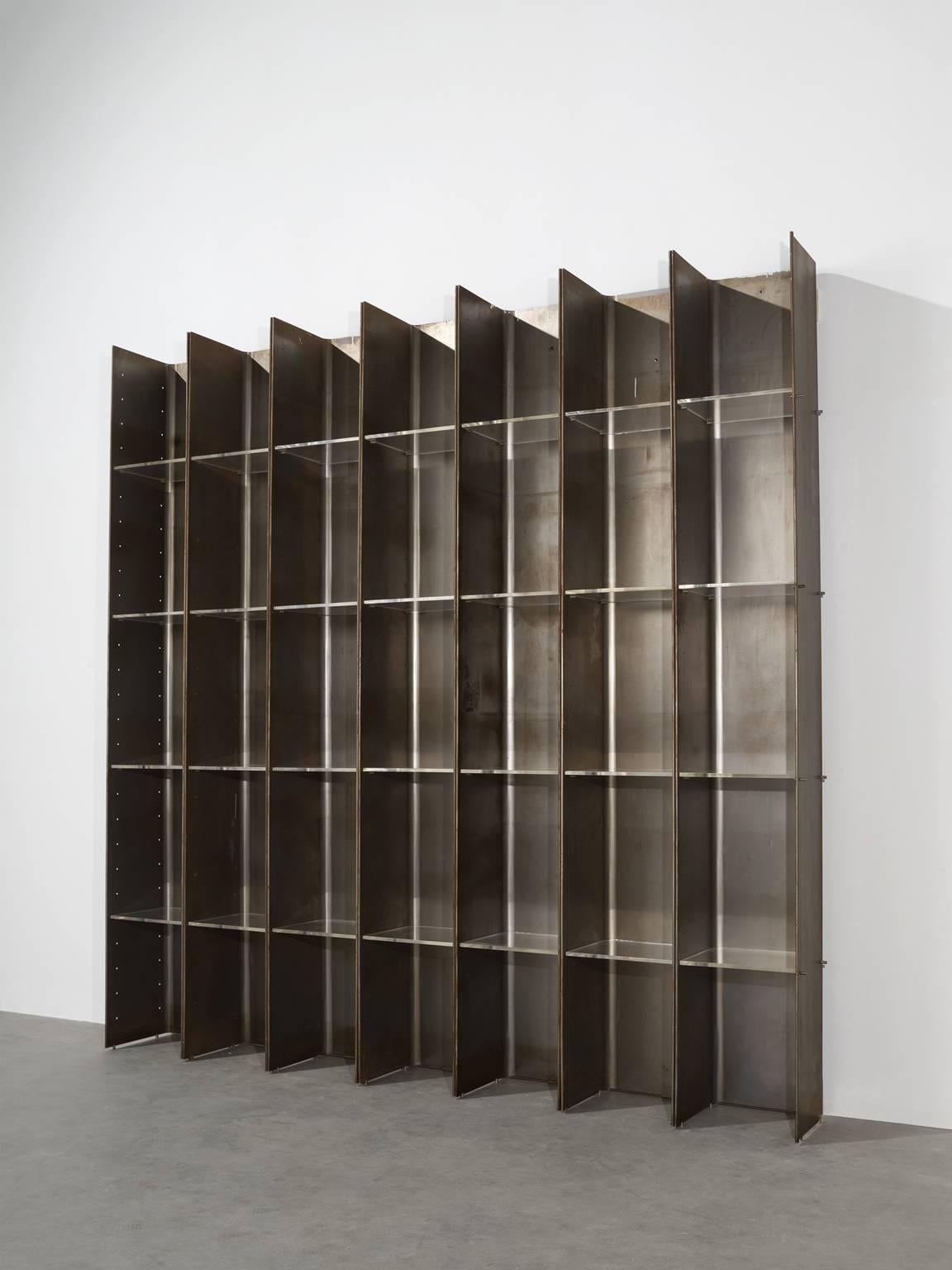Bookcase 'Valiant', in steel and plexiglass, by Carla Venosta & Guido Zimmerman for Arflex, Italy, 1971. 

This steel bookcase with plexiglass shelves has a clean and geometric design which is emphasized by the rawness of the materials. The steel