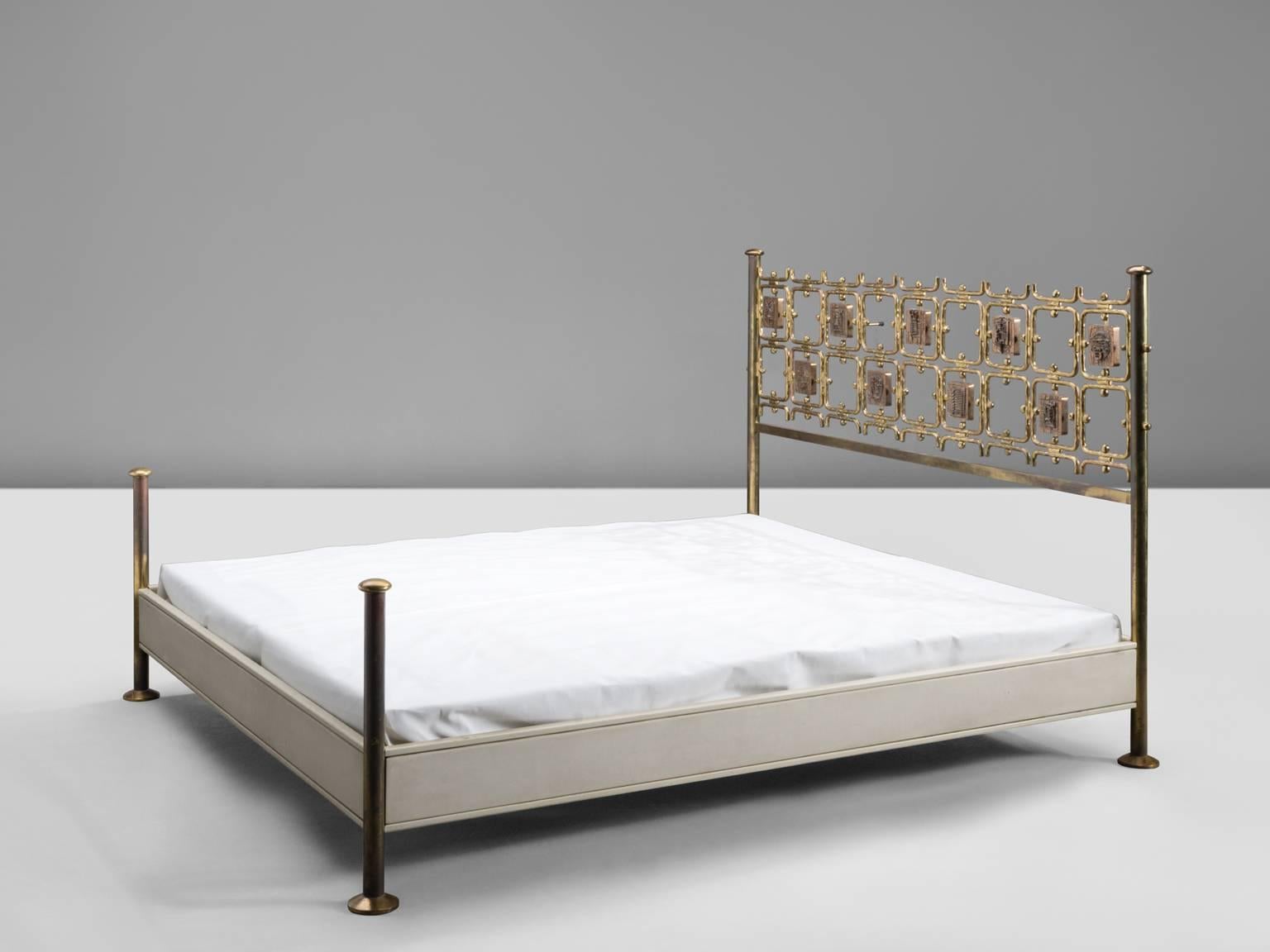 Bed, fire-enameled brass, hand-hammered brass, enameled steel, Italy, 1960s.

Osvaldo Borsani and Arnaldo Pomodoro designed this bed together. This decorative and frivolous bed is from Italian origin. The frame is highly detailed and especially