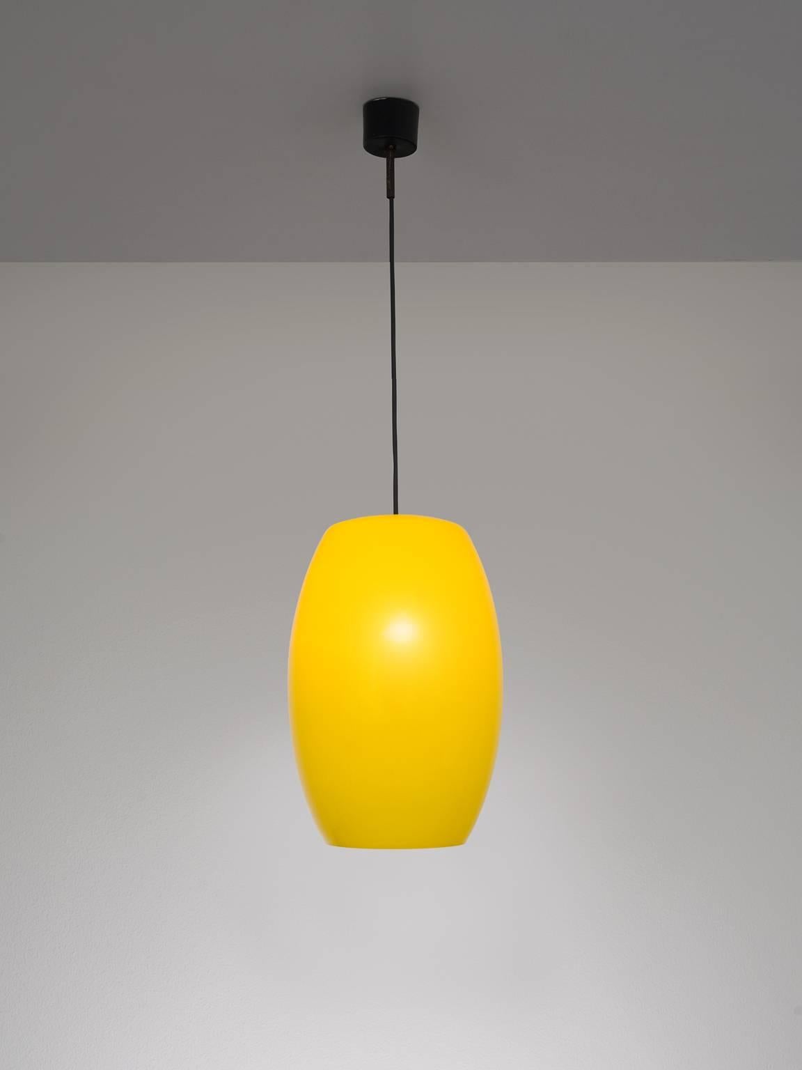 Pendant, opaline glass, Italy, 1960s.

This bright yellow oval pendant is executed in opaline glass. The pendant is large and boat shaped. The smooth yellow shades results in a warm light partition. This lamp is pure, clear and playful.

Glass: D 25