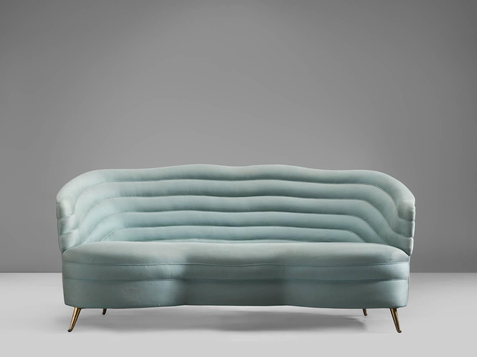 Andrea Busiri Vici, sofa in velvet and metal, Italy, 1960s.

This elegant sofa features an aquamarine, light-blue velvet. The term organic seems to be invented for this settee as it resembles something like a rock formation or waved entity. On the