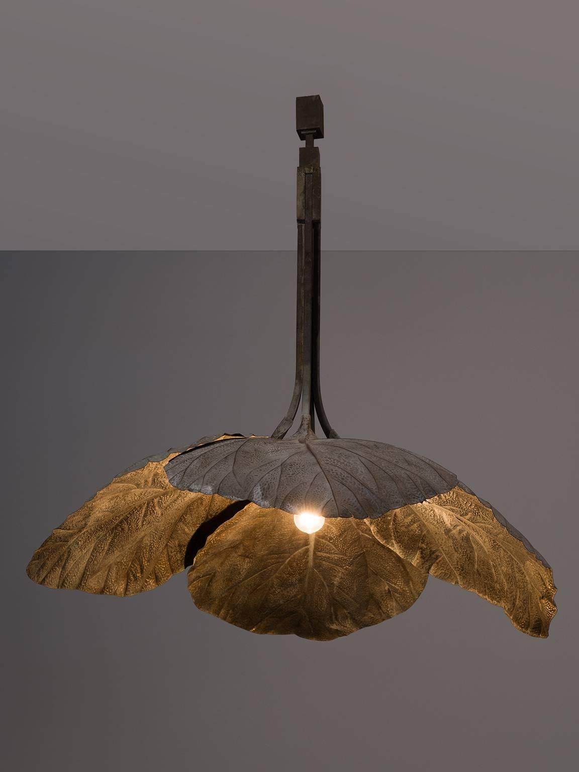Tomasso Barbi, chandelier, brass, Italy, 1970s. 

This ceiling lamp has a natural expression, and due to its unusual size it has the appearance of a piece of art. This chandelier is part of the midcentury design collection by Morentz. Several large