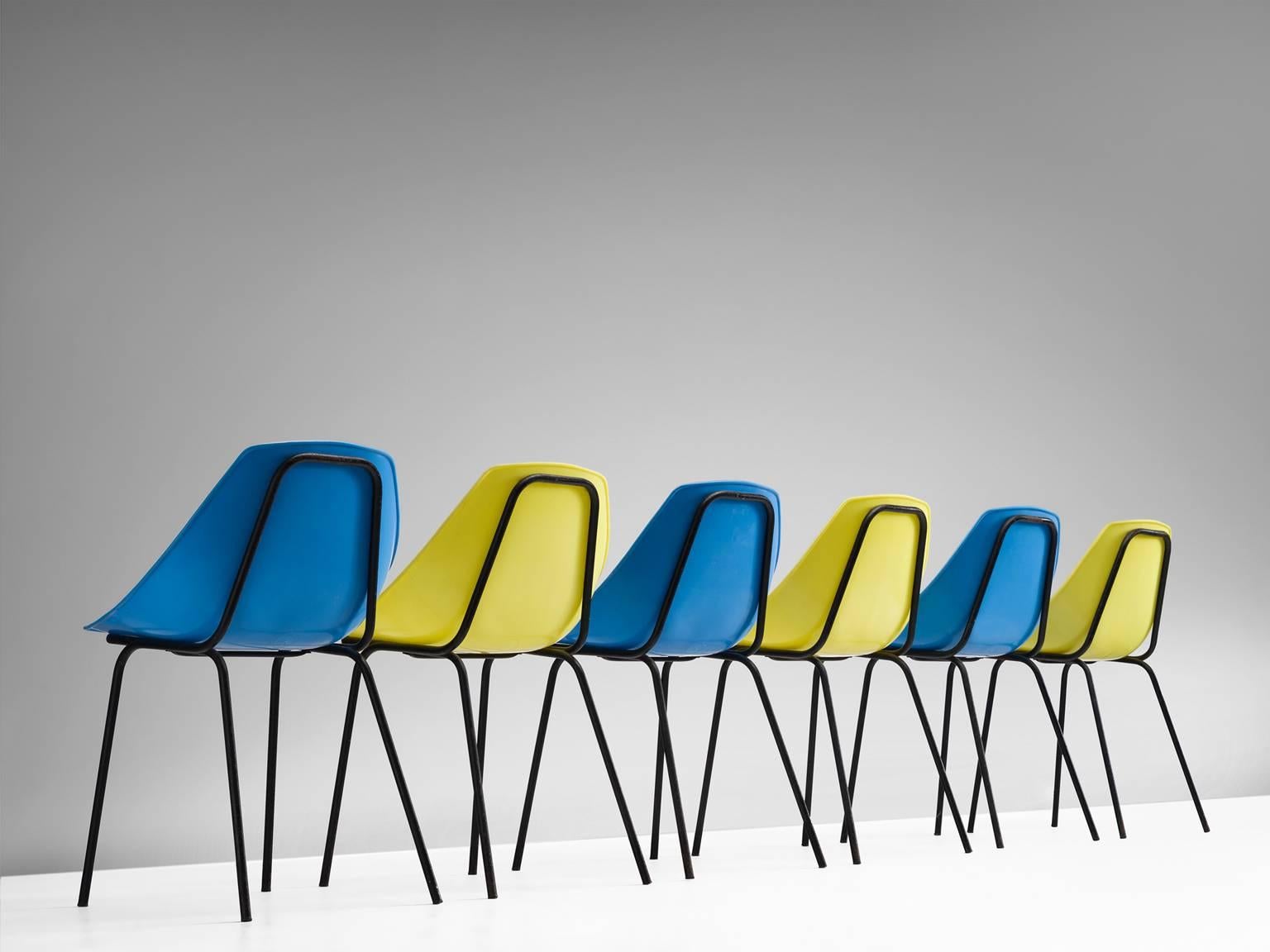 Set of six chairs in yellow and blue plastic, model 'Coquillage' manufactured by Meurop, Belgium, 1960s.

The playful lines of the seat shell work well with the industrial character of the black tubular frame. The design is basic and effective, the