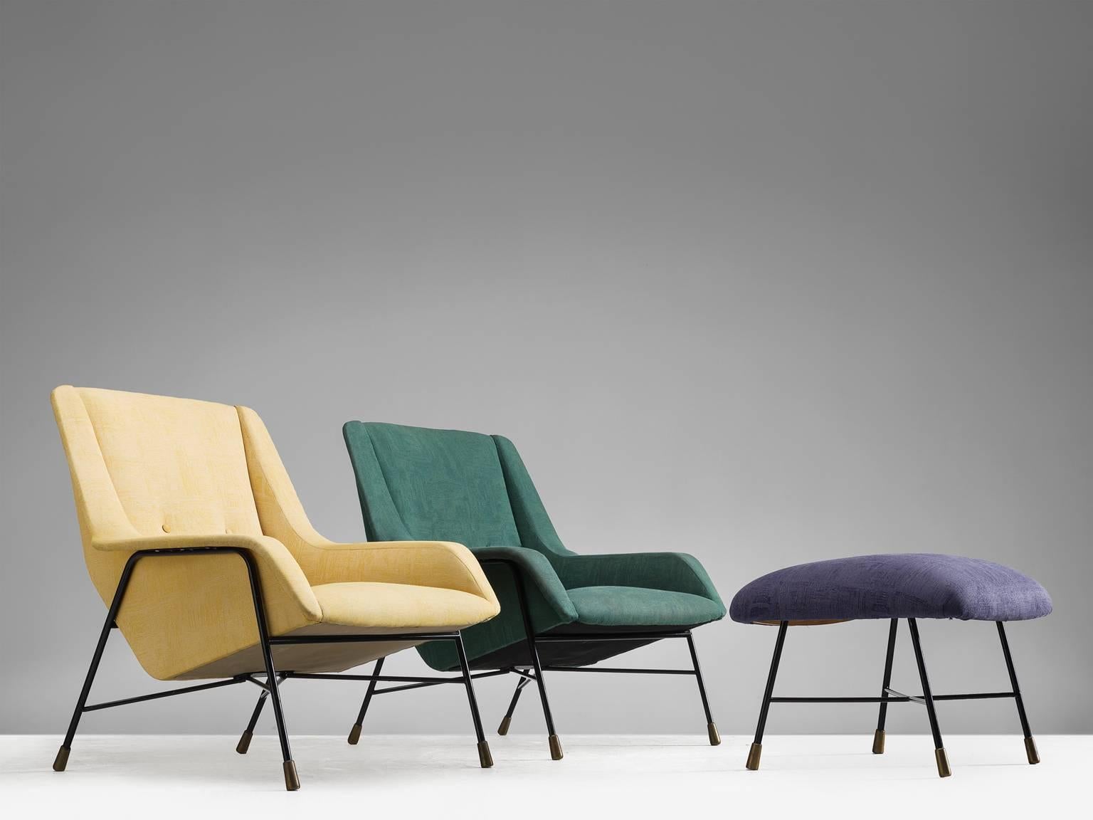 Highly rare pair of lounge chairs by the known Belgium designer Alfred Hendrickx. The models shown is documented as the S12 model produced by Belform, Belgium in the late 1950s.

The armchairs and matching footstool show a lot of influences on some