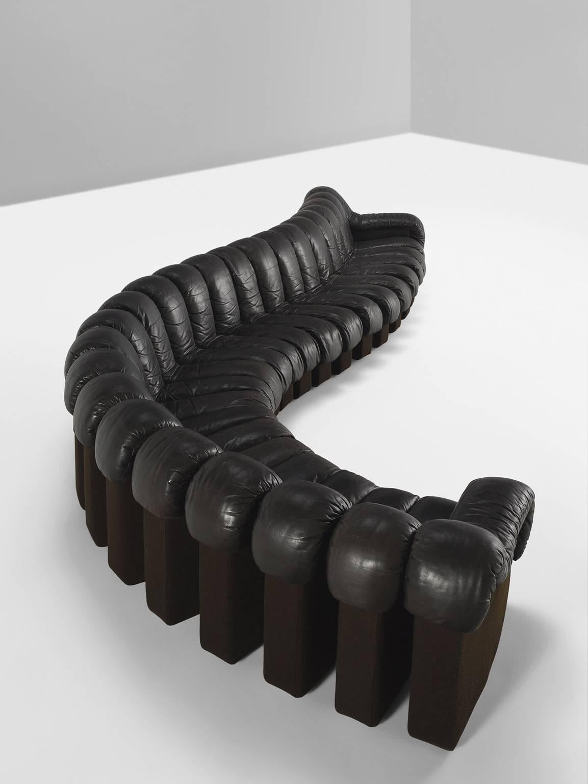 De Sede ‘Snake’ DS-600, in dark brown leather, Switzerland, 1972. 

De Sede 'Non Stop' sectional sofa containing 24 pieces in original dark brown leather, of which 22 center pieces and two armrests. Any number of pieces can be zipped together