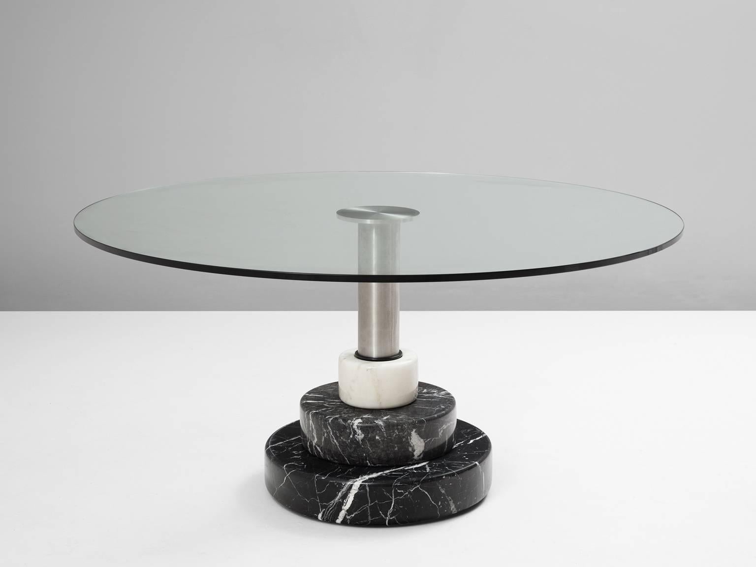 Table model 'Menhir', in marble, stainless steel and glass, by Lodovico Acerbis and Giotto Stoppino for Acerbis International, Italy, 1983.

This well designed table was part of the 