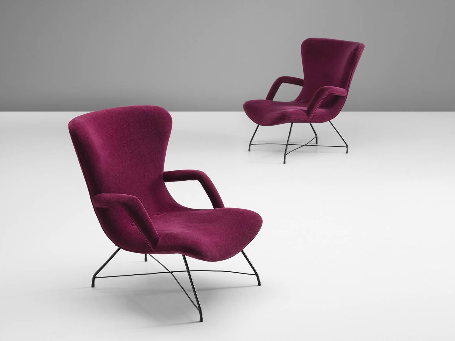 Pair of armchairs, in iron and pink magenta velvet fabric, by Carlo Hauner and Martin Eisler for Forma, Brazil, 1950s. 

Elegant and modern armchairs by Brazilian designer duo Hauner & Eisler. The frame is made from thin, elegant wrought iron.