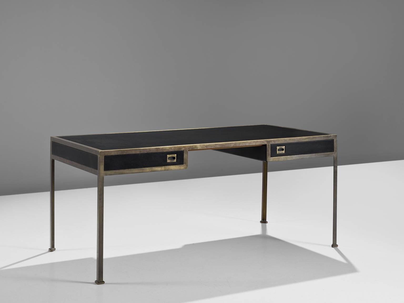 Desk, leather and brass, France, 1960s.

This desk is simplistic in its design but extremely refined. The desk is defined by use of the high-quality, durable materials brass and leather. These materials have the intrinsic qualities of becoming