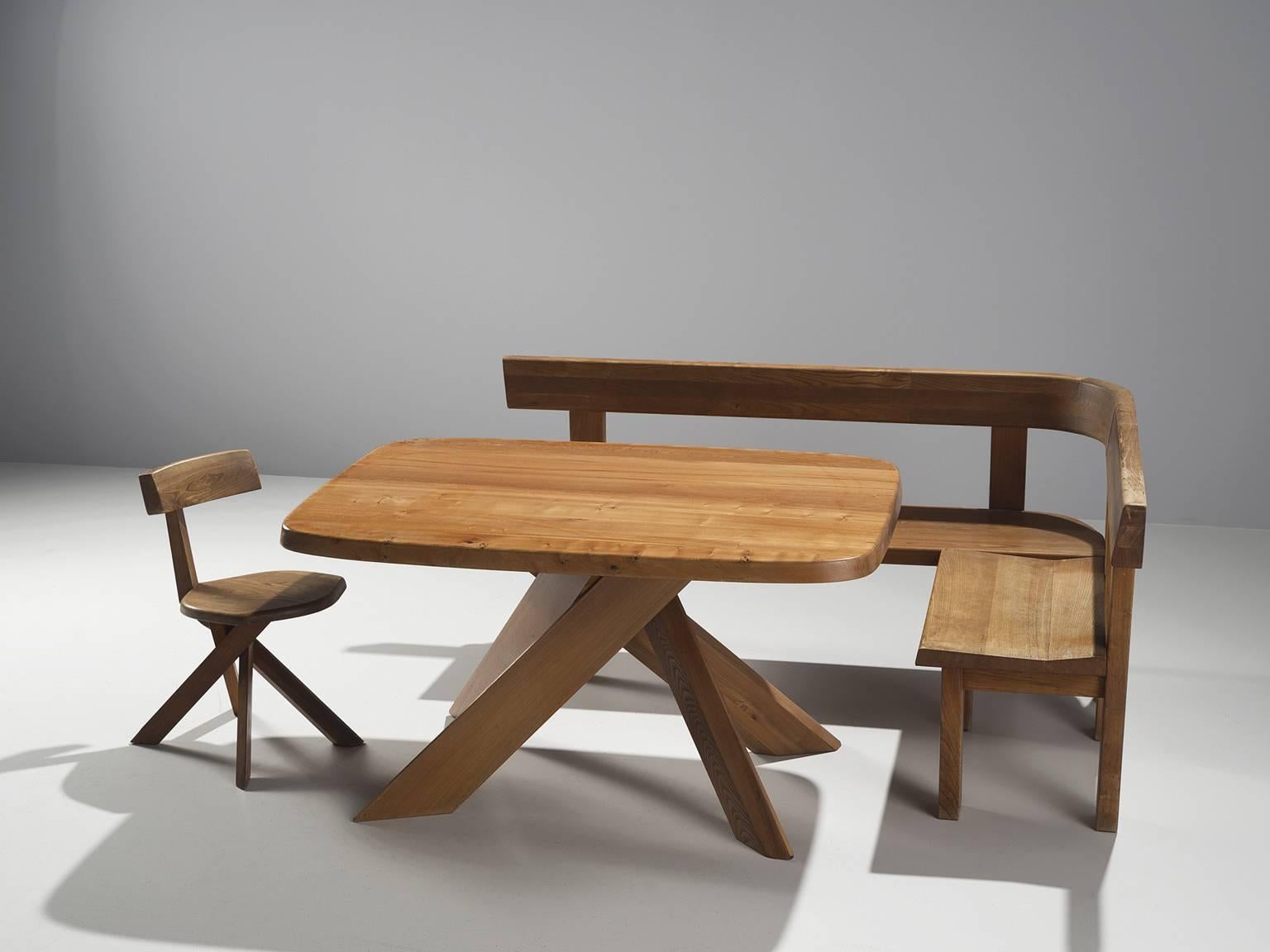 Dining set, solid elmwood by Pierre Chapo, France, 1960s.

The basic design and construction, as well as the use of solid elmwood characterizes the work of Chapo. The interesting base of the table is build with just four legs, with angled edges to