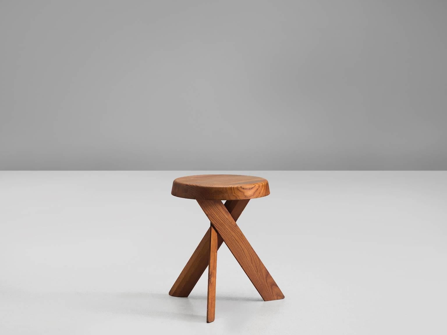 Stool S31, in elm by Pierre Chapo, France, 1960s.

This asymmetrical stool with twisted is an icon of Pierre Chapo's playful and solemn, solid designs. The piece is made of solid elm and shows the characteristics of Pierre Chapo. First of all the