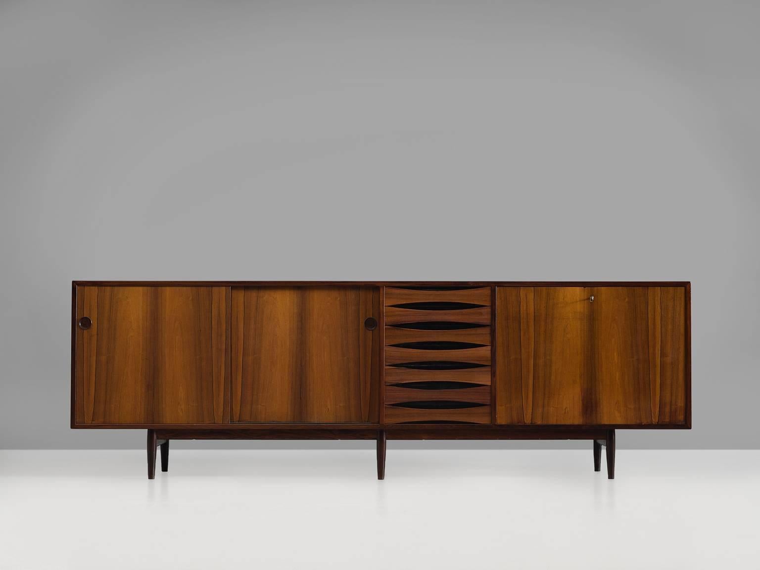 Credenza model 29A, in rosewood by Arne Vodder for P. Olsen Sibast Møbler, Denmark, 1959.

Iconic sideboard in rosewood by Danish designer Arne Vodder. The typical refined Vodder details can be found on this sideboard, for example, the