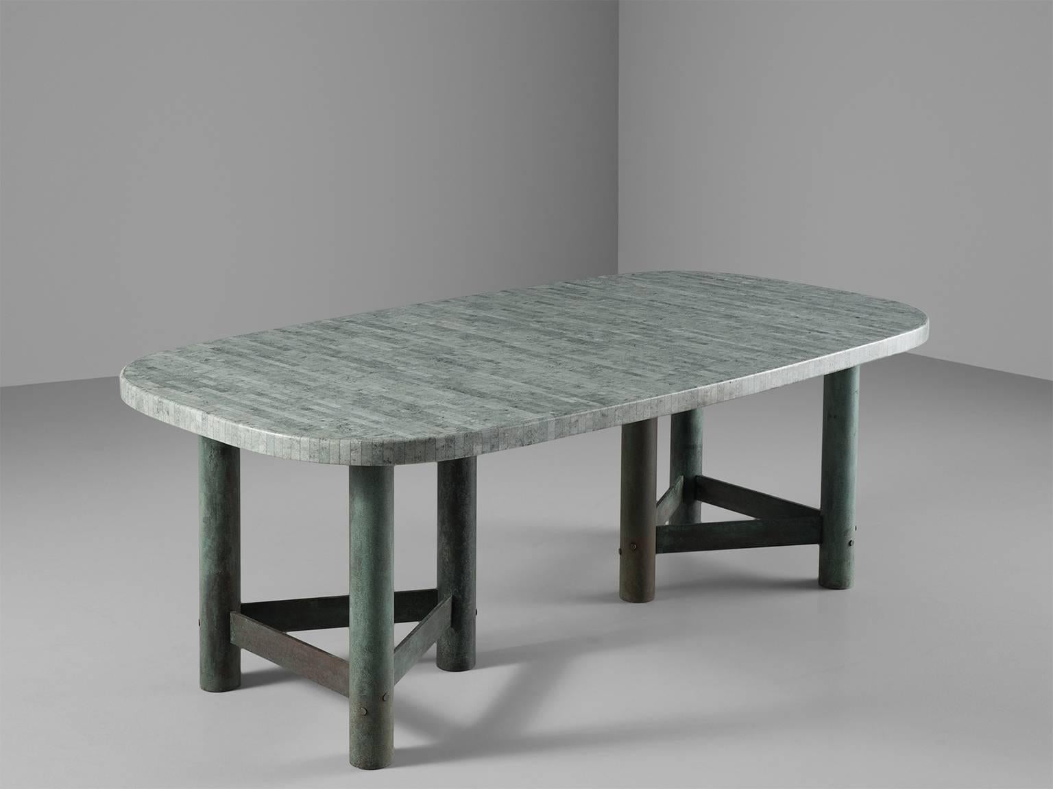 Dining table, marble and patinated bronze by Jan Vlug, Belgium, 1970s.

Exclusive dining table with characteristic graphical base and oval marble top. The base, made of metal, consists of six legs, formed into a star-shape. Two triangles combine