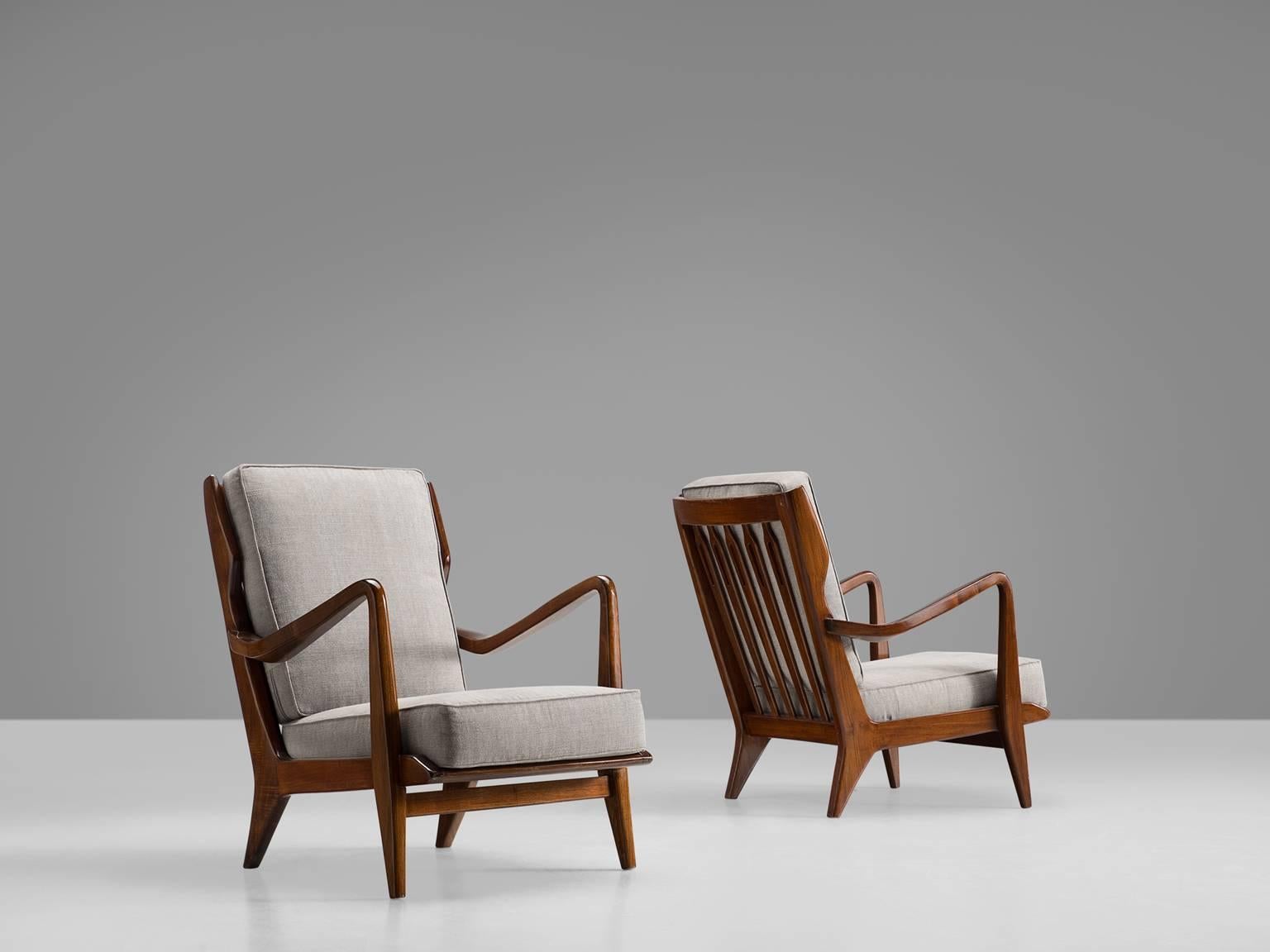 Gio Ponti for Cassina, pair of armchairs model 516, wood, grey upholstered fabric, Cassina, Italy, 1955, (expertise by Gio Ponti archives).

This set of chairs is designed by Gio Ponti and manufactured by Cassina. The chairs have a few distinct