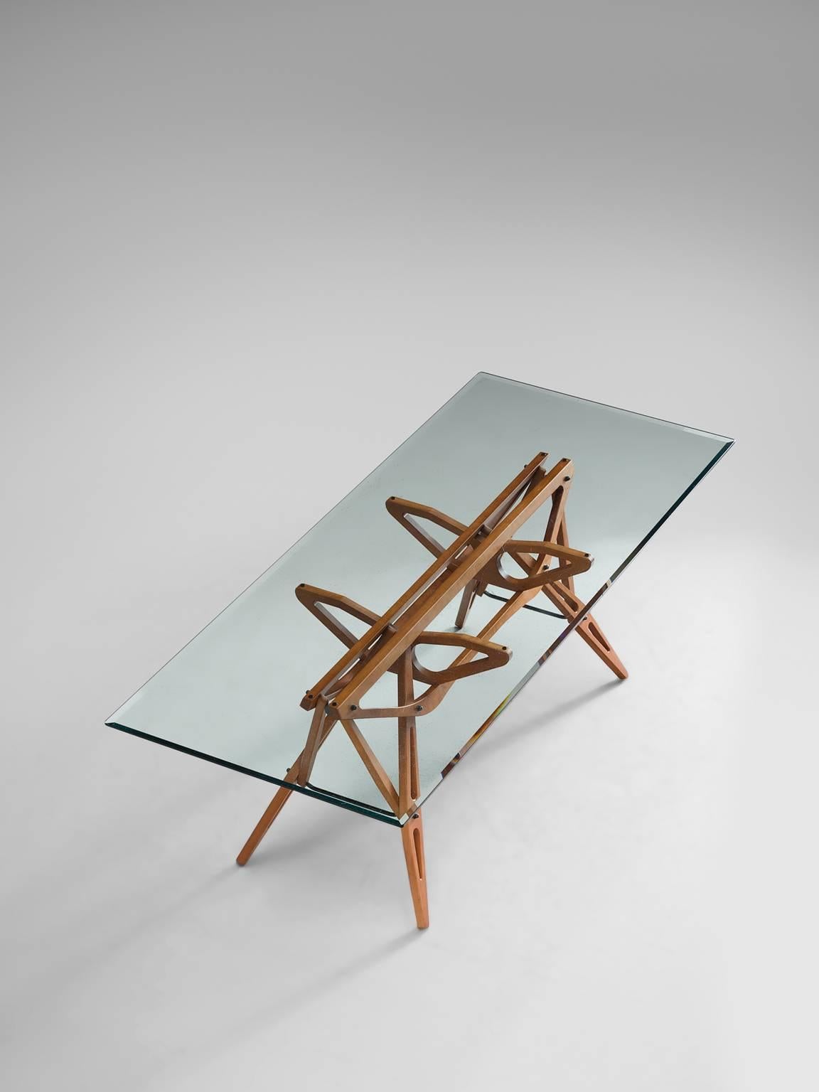 Dining table model Reale by Carlo Mollino for Zanotta, Italy, design 1946, production 1980s.

This complex, ingenious table seems to have appeared from nature itself. The icon by Mollino is defined by organic shapes such as horns, tree branches