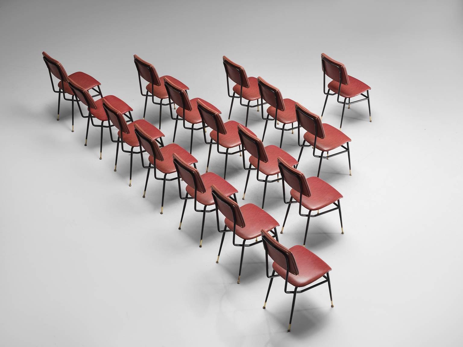 Studio Architects BBPR (attributed), set of sixteen chairs, red faux leather, metal, brass, Italy, 1950s

This 16 chairs with varnished metal rod structure are upholstered with reddish pink leatherette. The chairs are delicate and slender yet strong