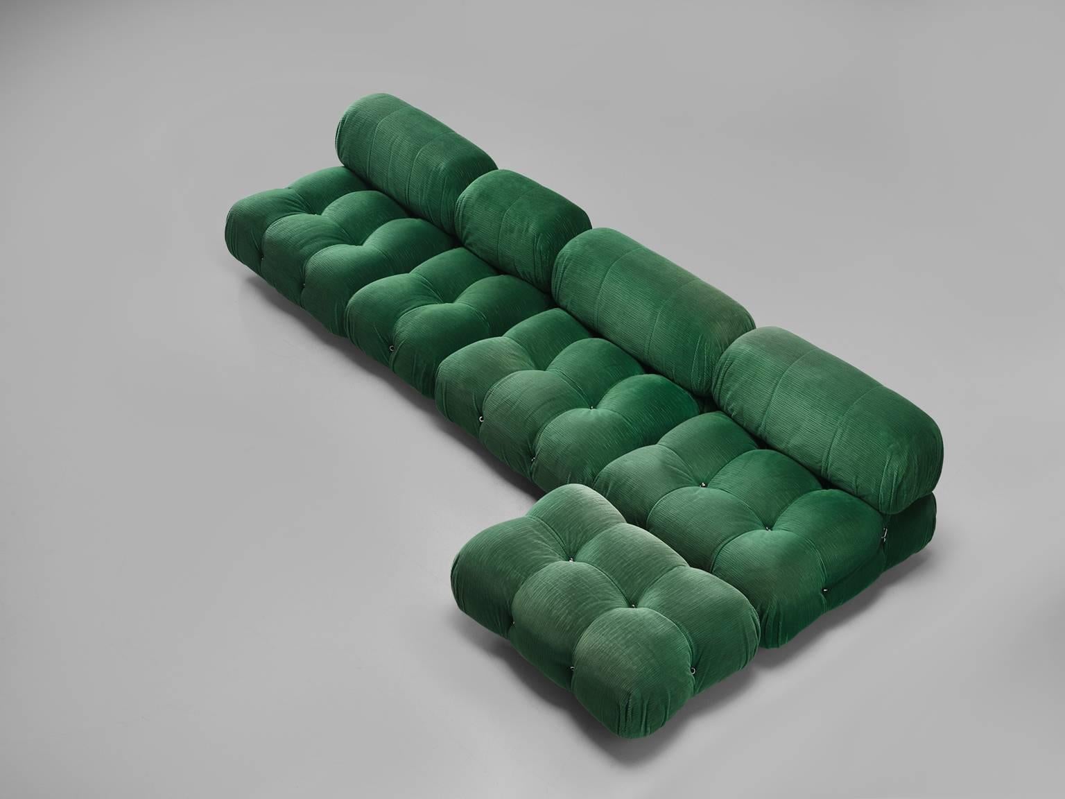 Mario Bellini, large modular 'Cameleonda' sofa in green original fabric, Italy 1972.

The sectional elements of this can be used freely and apart from one another. The backs and armrests are provided with rings and carabiners, which allows the