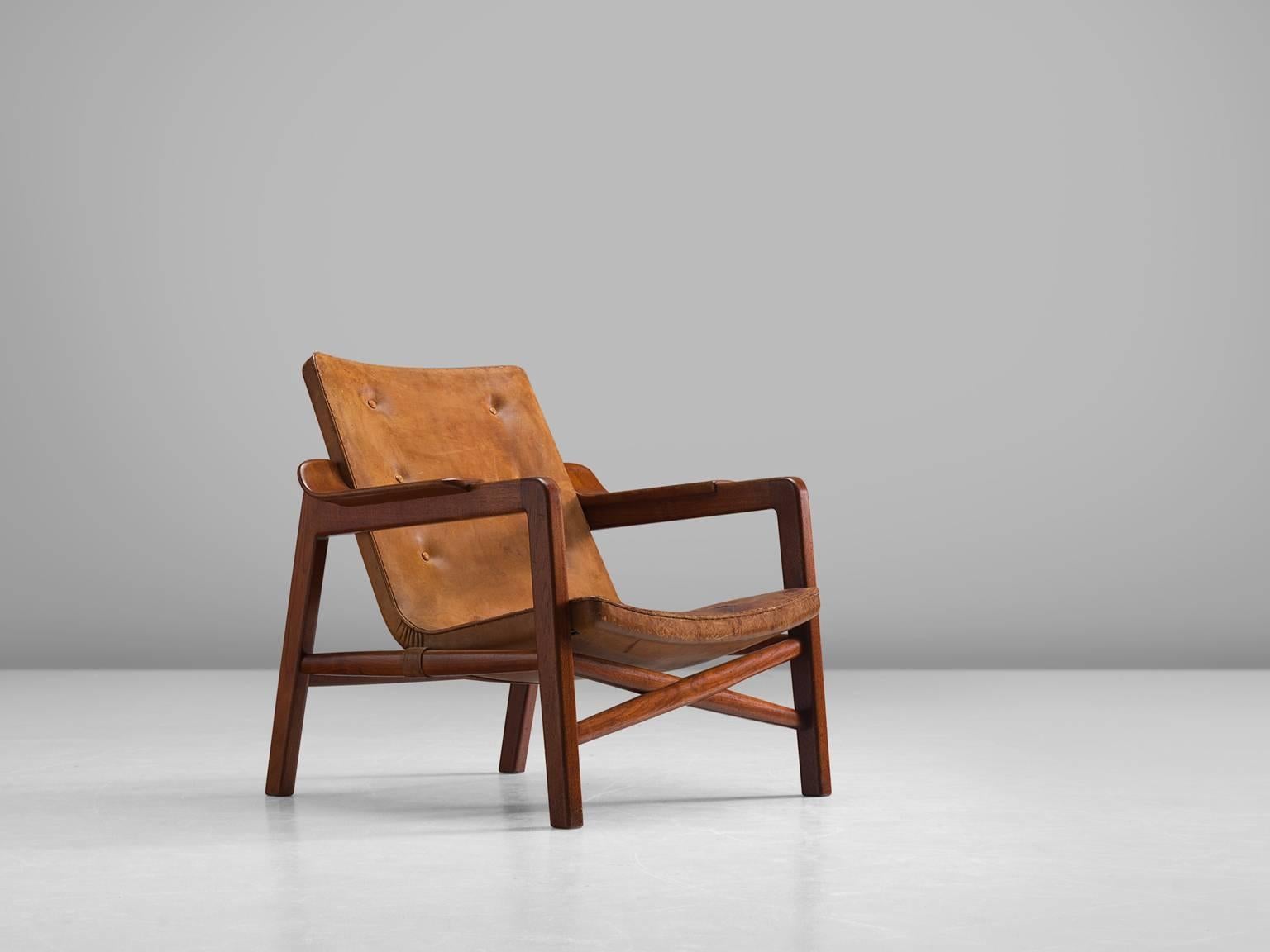 Tove & Edvard Kindt-Larsen for Gustav Bertelsen, 'Fireplace' chair, in teak and leather, Denmark, 1939.

This lounge chair was specially designed to sit in front of a fireplace. When it was first exhibited, this model was mentioned as a