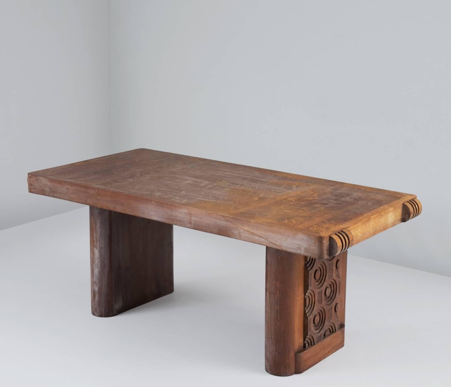 Charles Dudouyt dining table in oak, France, 1930s.

This high quality table, made of oak, has been made with a wonderful detailed wooden inlay pattern on top, showing great craftsmanship, the top simply is spectacular. It is in a beautifully aged