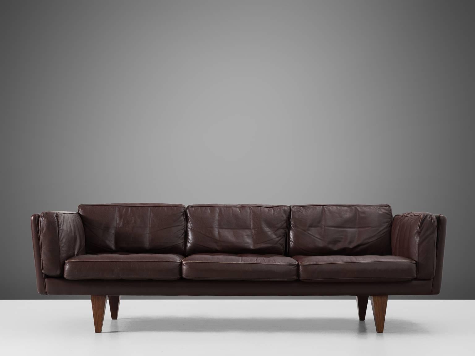 Illum Wikkelsø, sofa model V11, brown leather and wood, Denmark, 1960s.

Stunningly three-seat sofa, designed by Danish designer Illum Wikkelsø. Highly comfortable and beautiful designed sofa with dark brown leather upholstery. The dark brown high